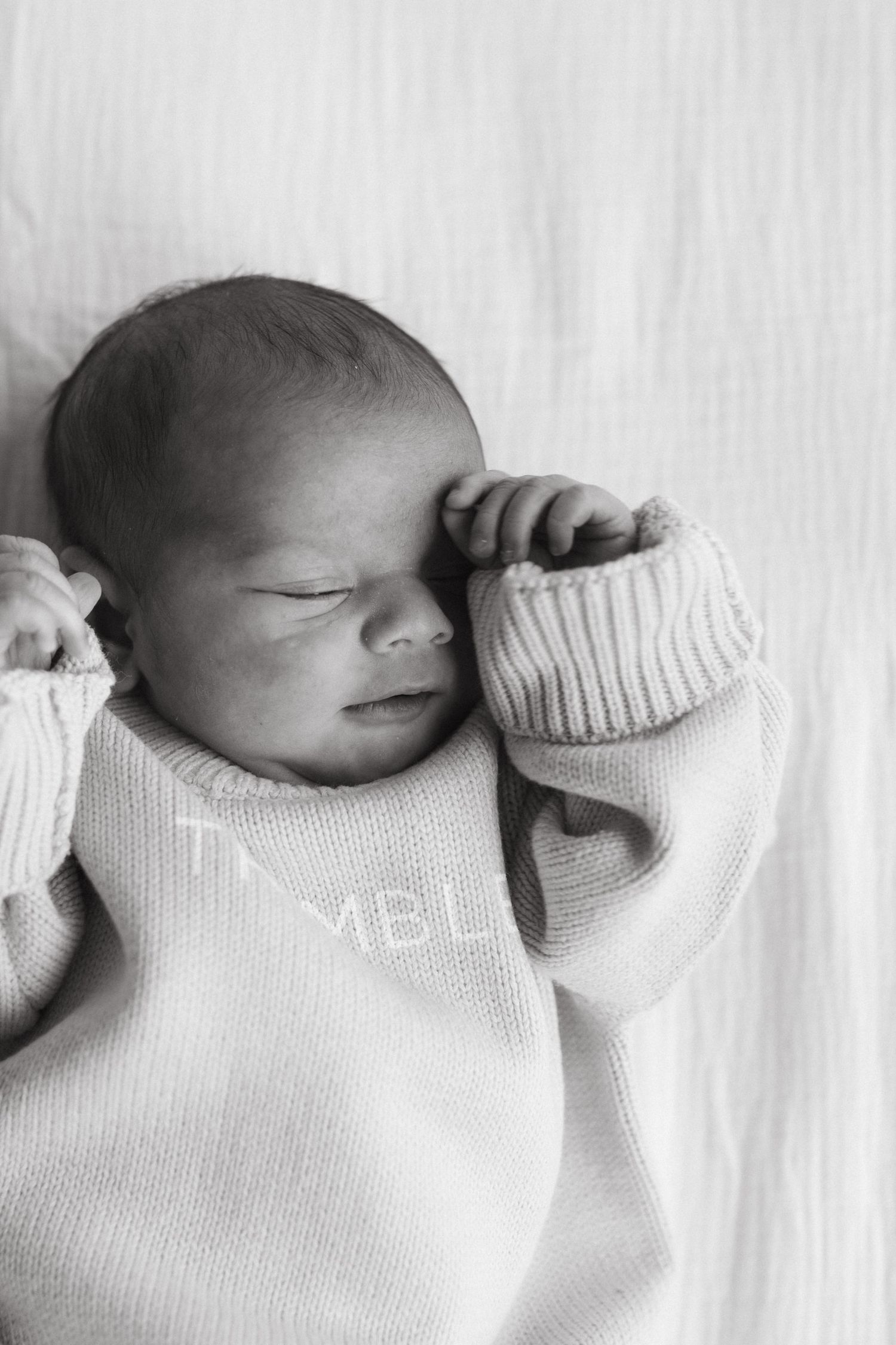 In-home newborn photography in Rock Hill SC capturing newborn baby details and family connection