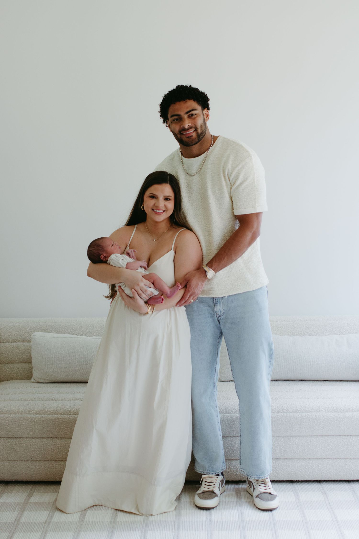 Parents holding their newborn baby