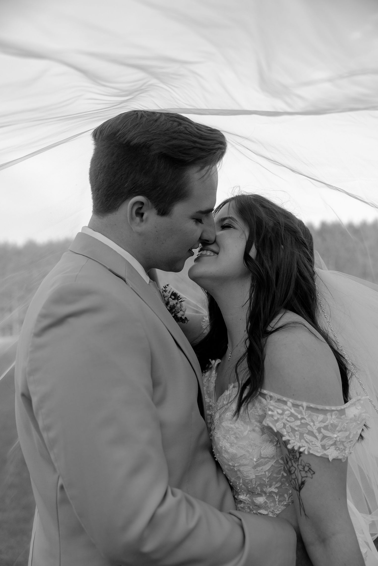 Bride and groom sharing a romantic moment during their wedding located in rock hill