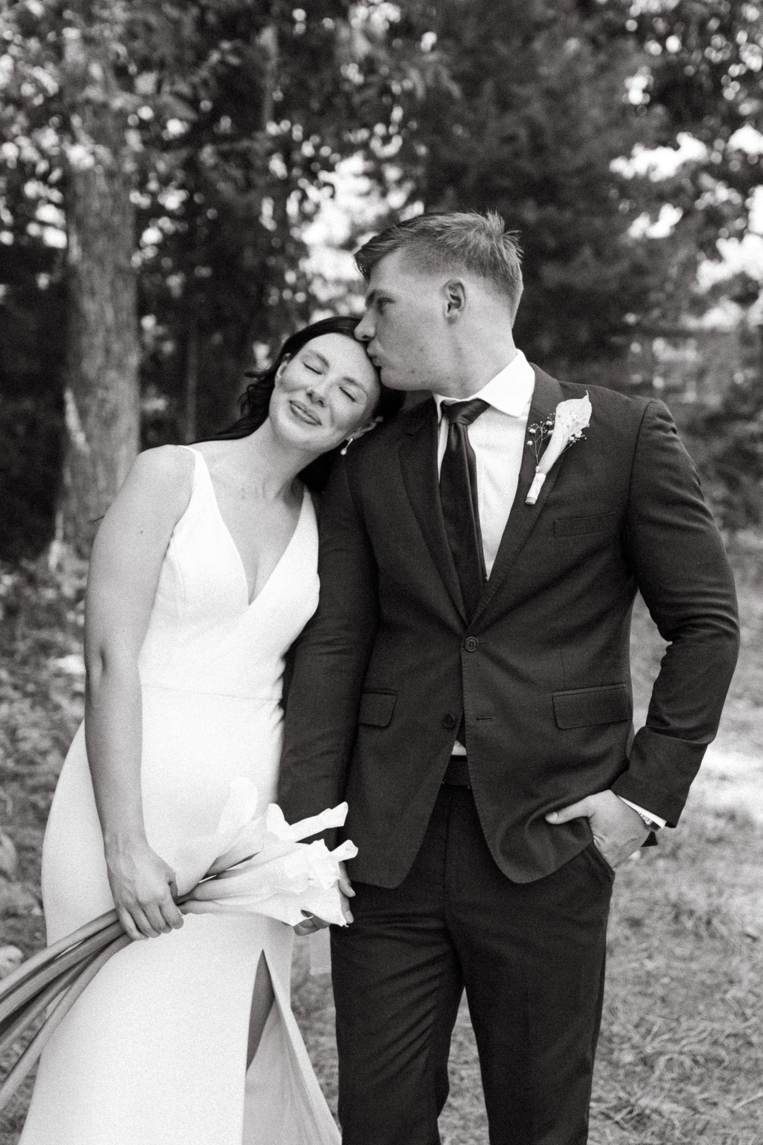 Bride and groom sharing a romantic moment during their wedding