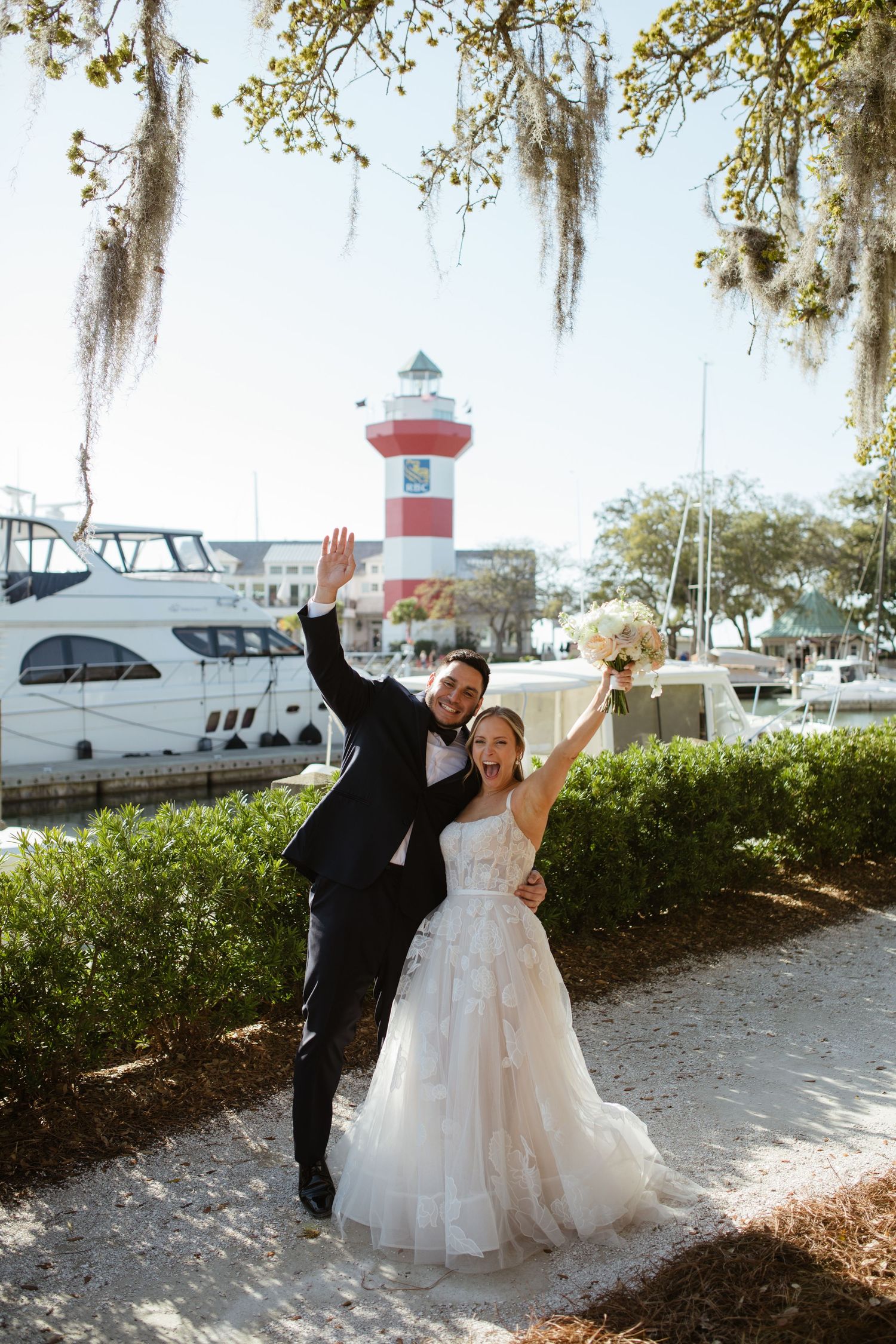 A newlywed couple celebrating their Charlotte wedding.