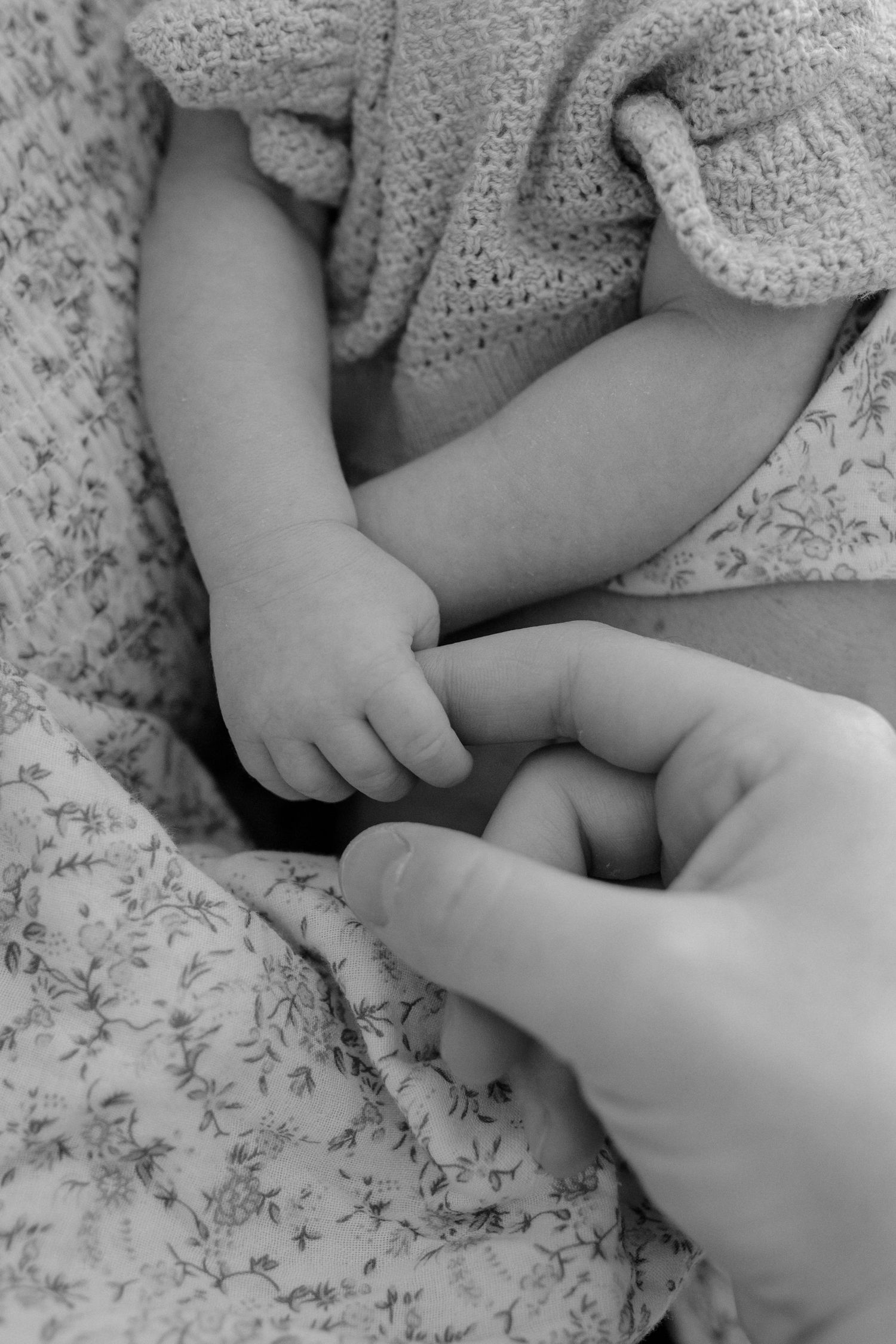 Lifestyle newborn portrait captured at home