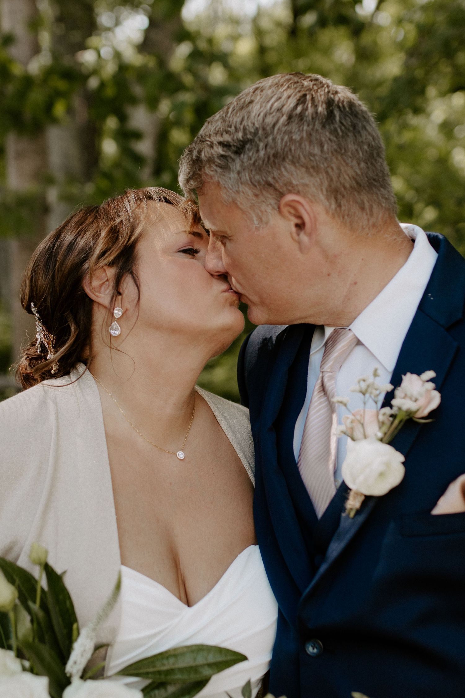 Bride and groom sharing a romantic moment during their wedding