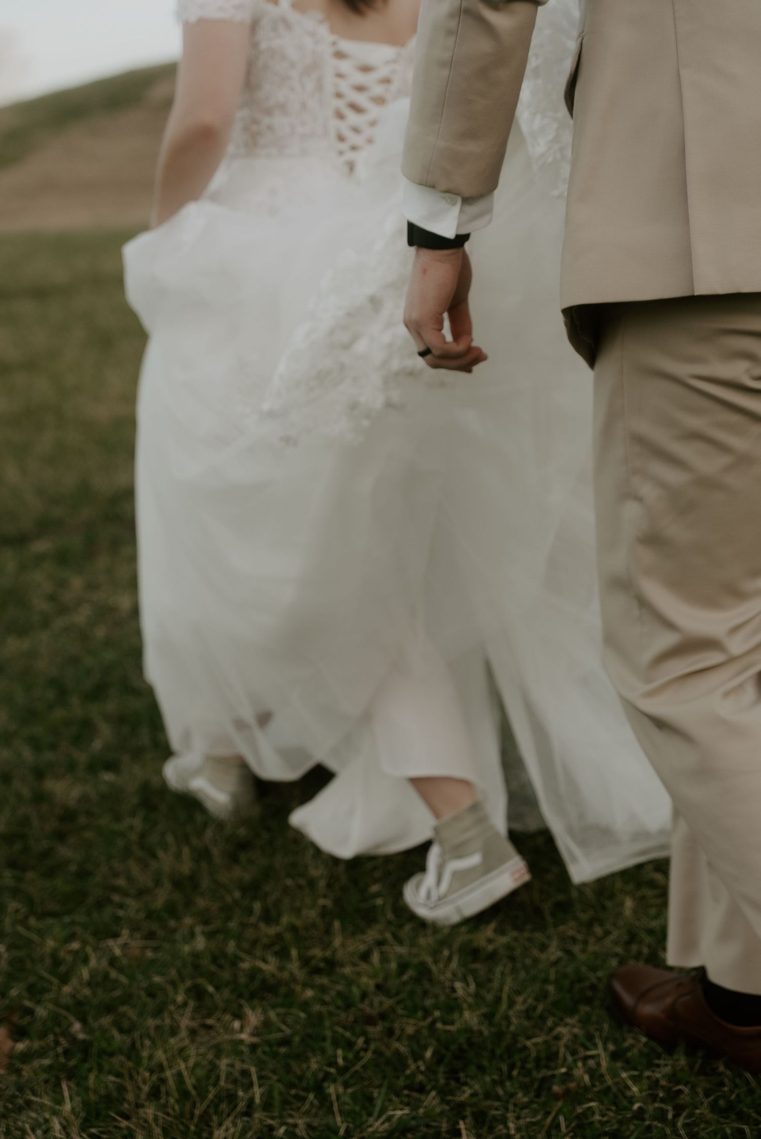 bride running in her wedding dress