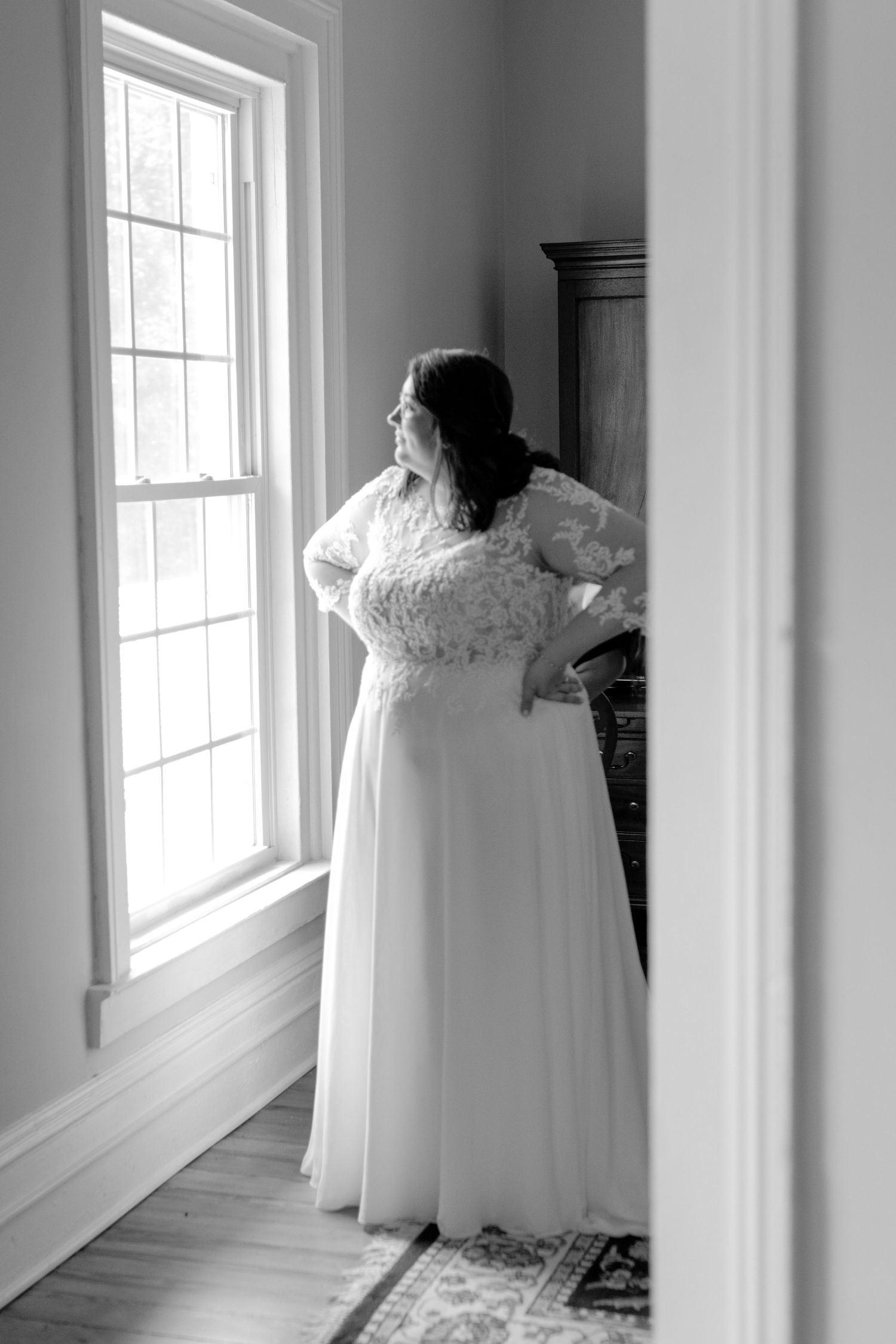Beautiful bride in her wedding dress indoors