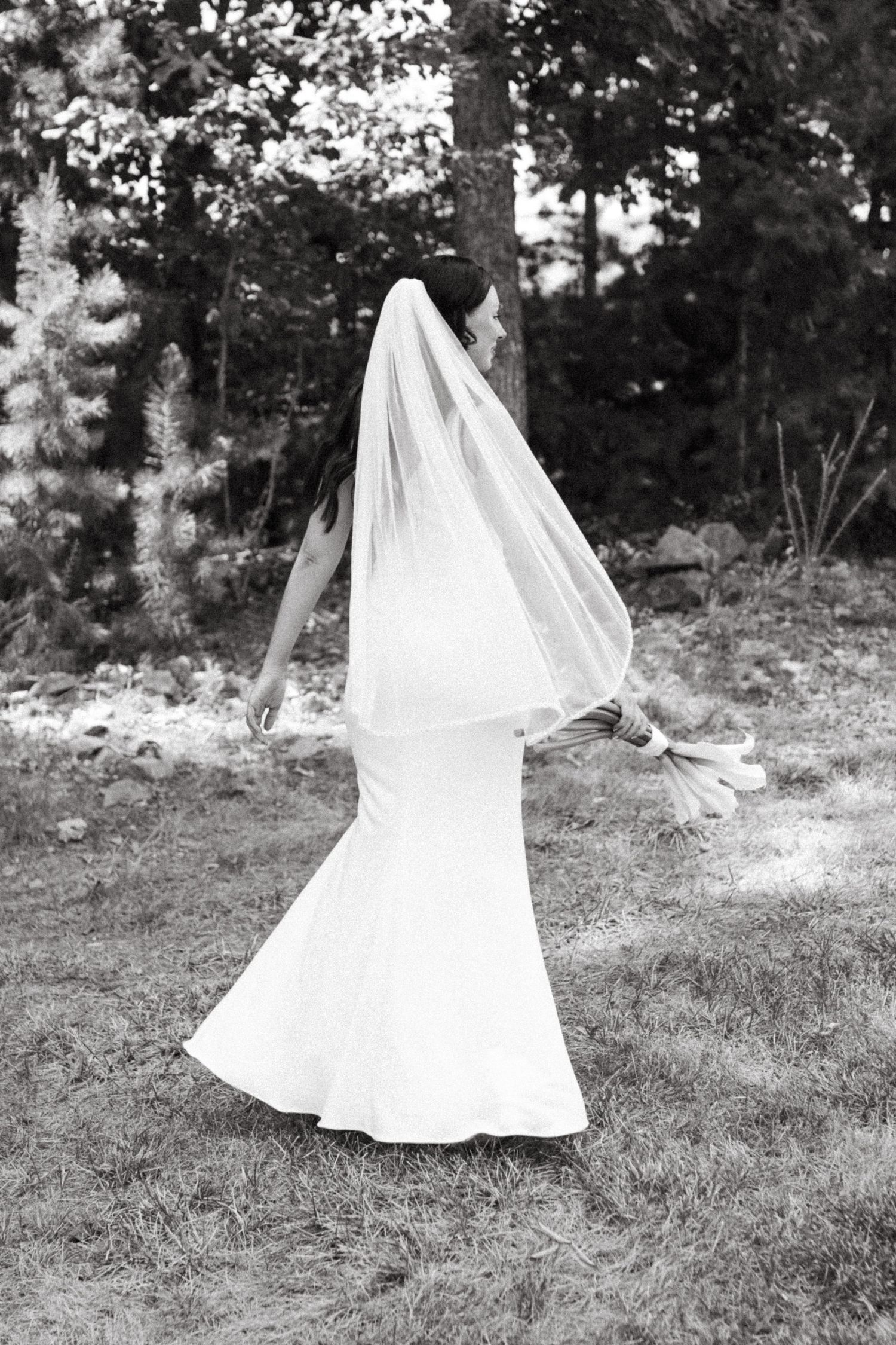 Beautiful bride in her wedding dress outdoors