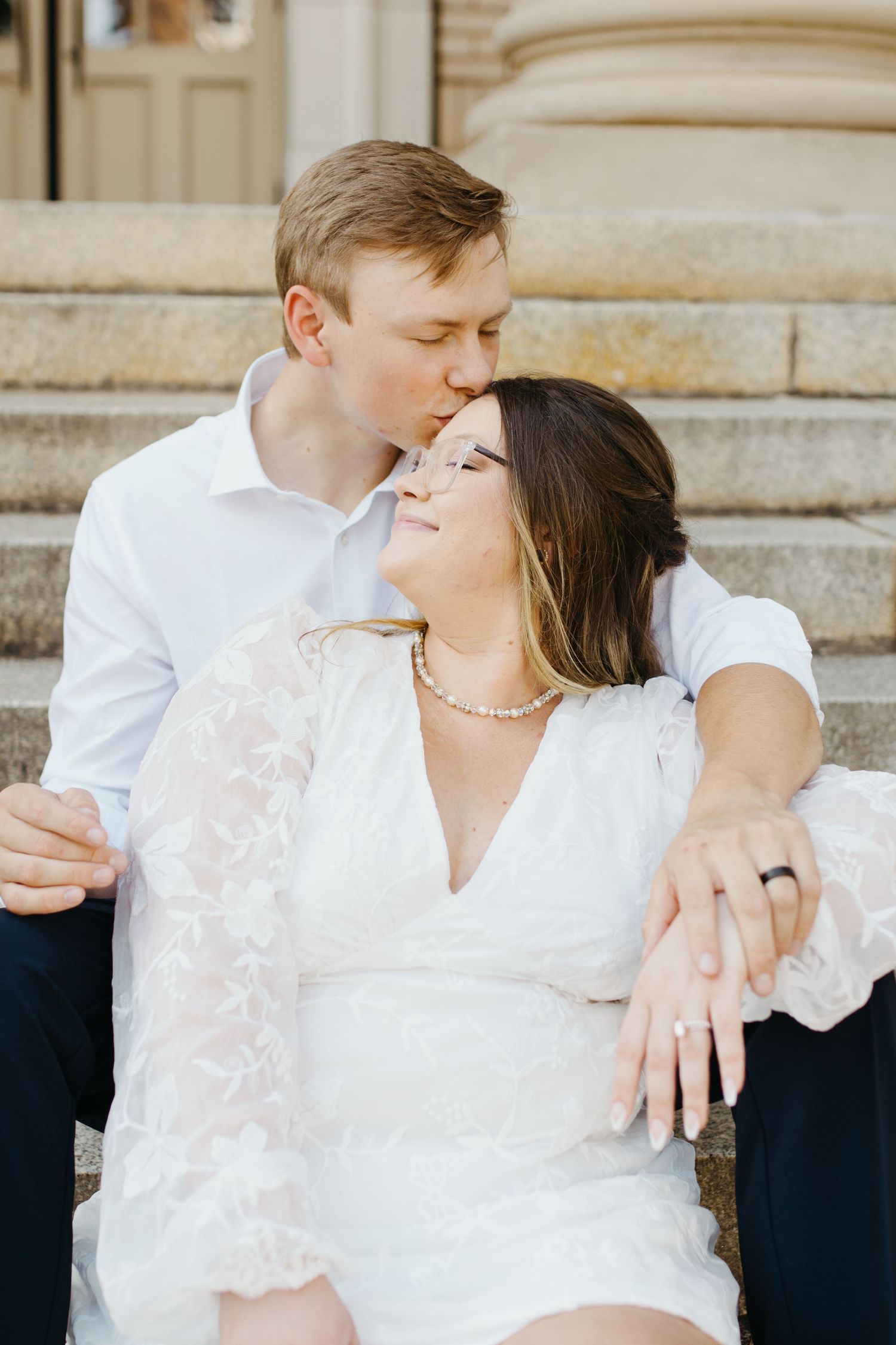 Bride and groom sharing a romantic moment during their wedding at the courthouse in york