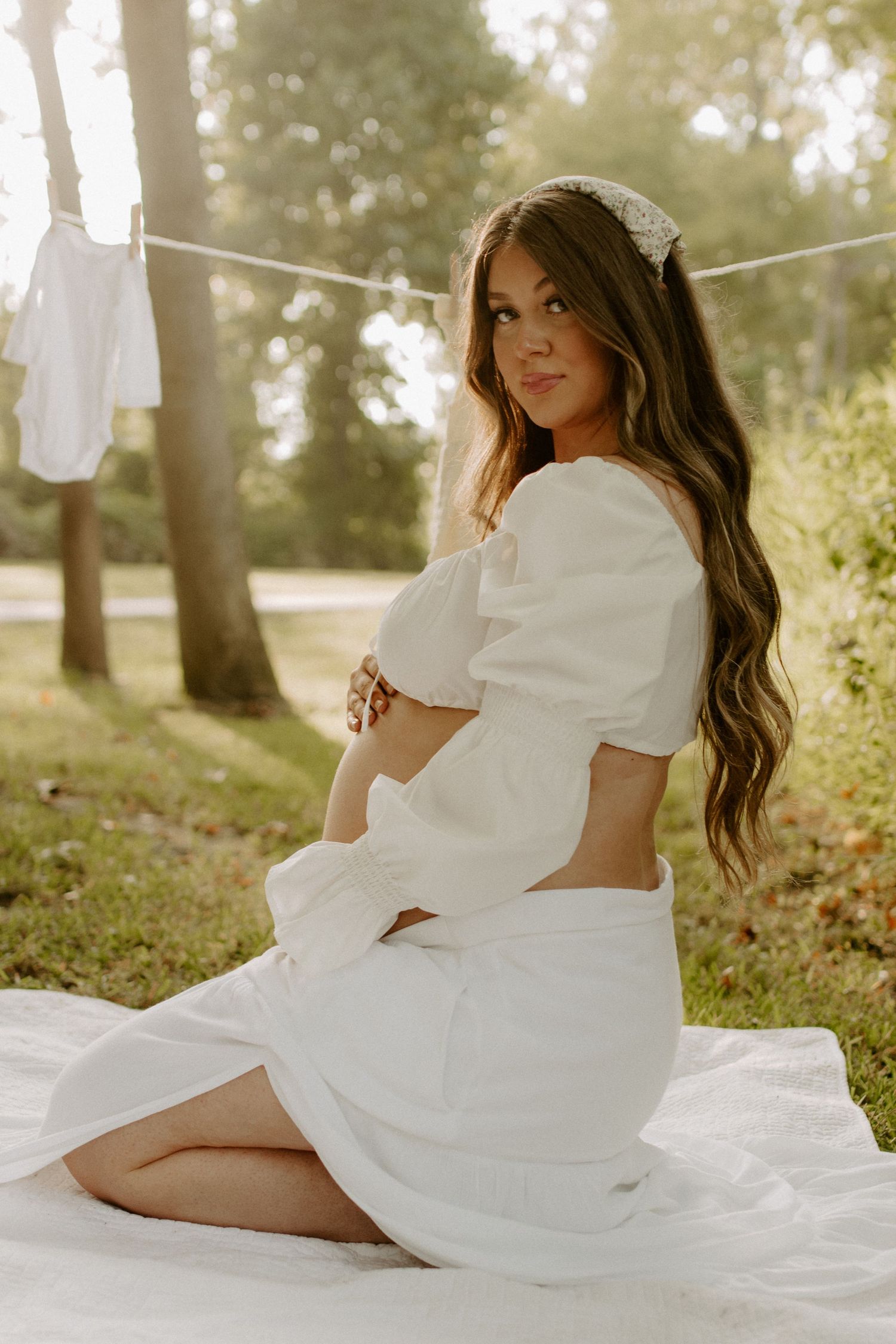 Pregnant woman posing outdoors during maternity photo session in rock hill