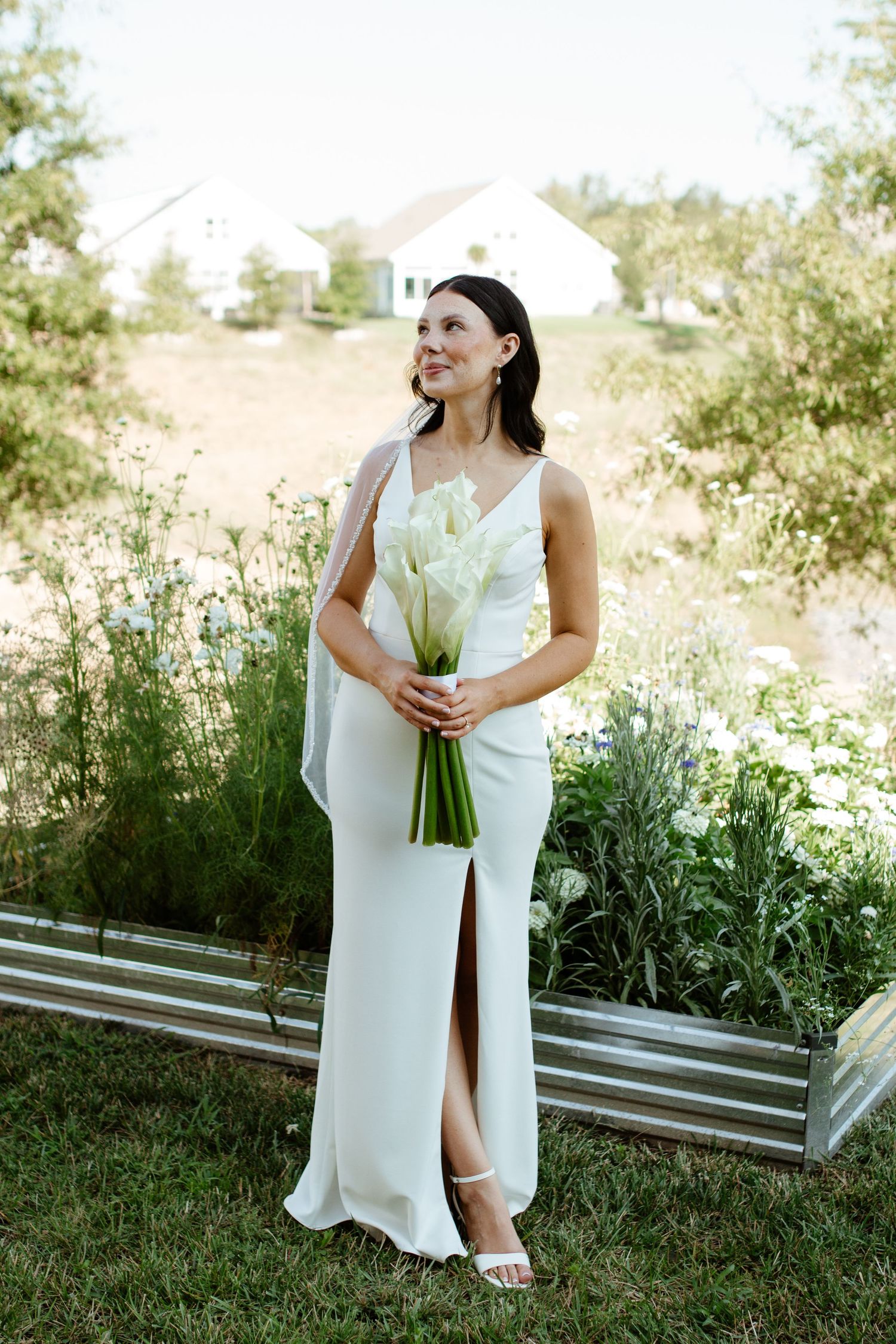 Beautiful bride in her wedding dress outdoors
