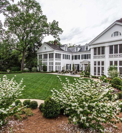 photo of the duke mansion in charlotte nc with beautiful blooms outside