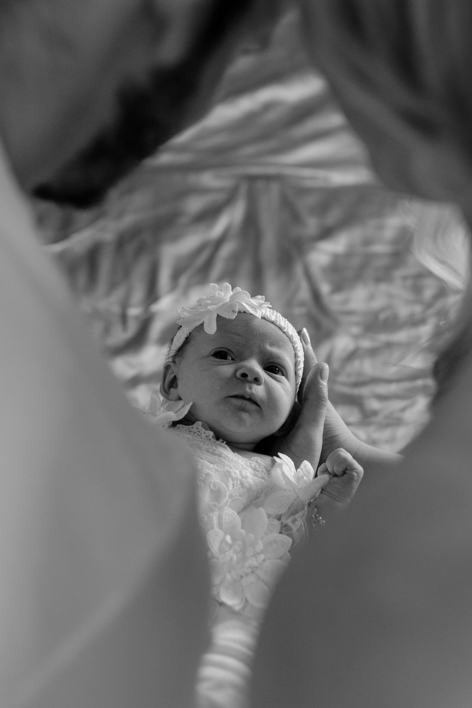 Parents holding newborn baby Rock Hill South Carolina newborn photography