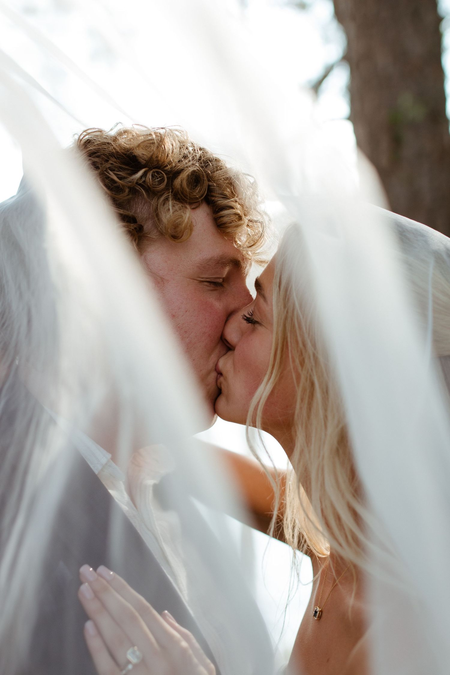 Bride and groom sharing a romantic moment during their wedding