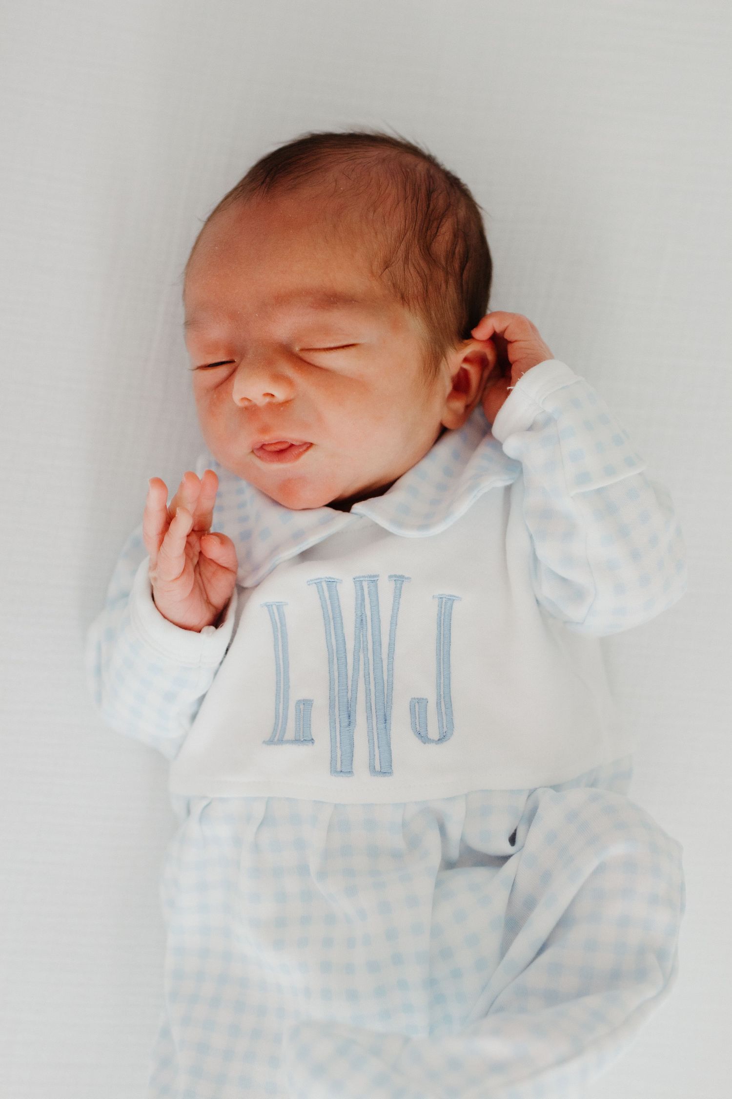 Lifestyle newborn portrait captured at home in Rock hill