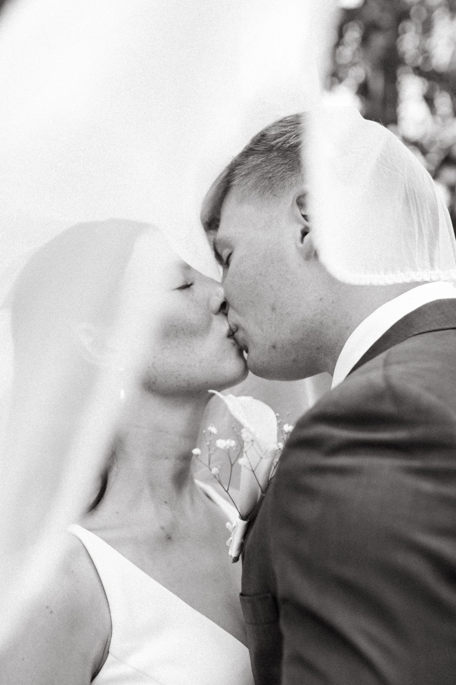 Bride and groom sharing a romantic moment during their wedding