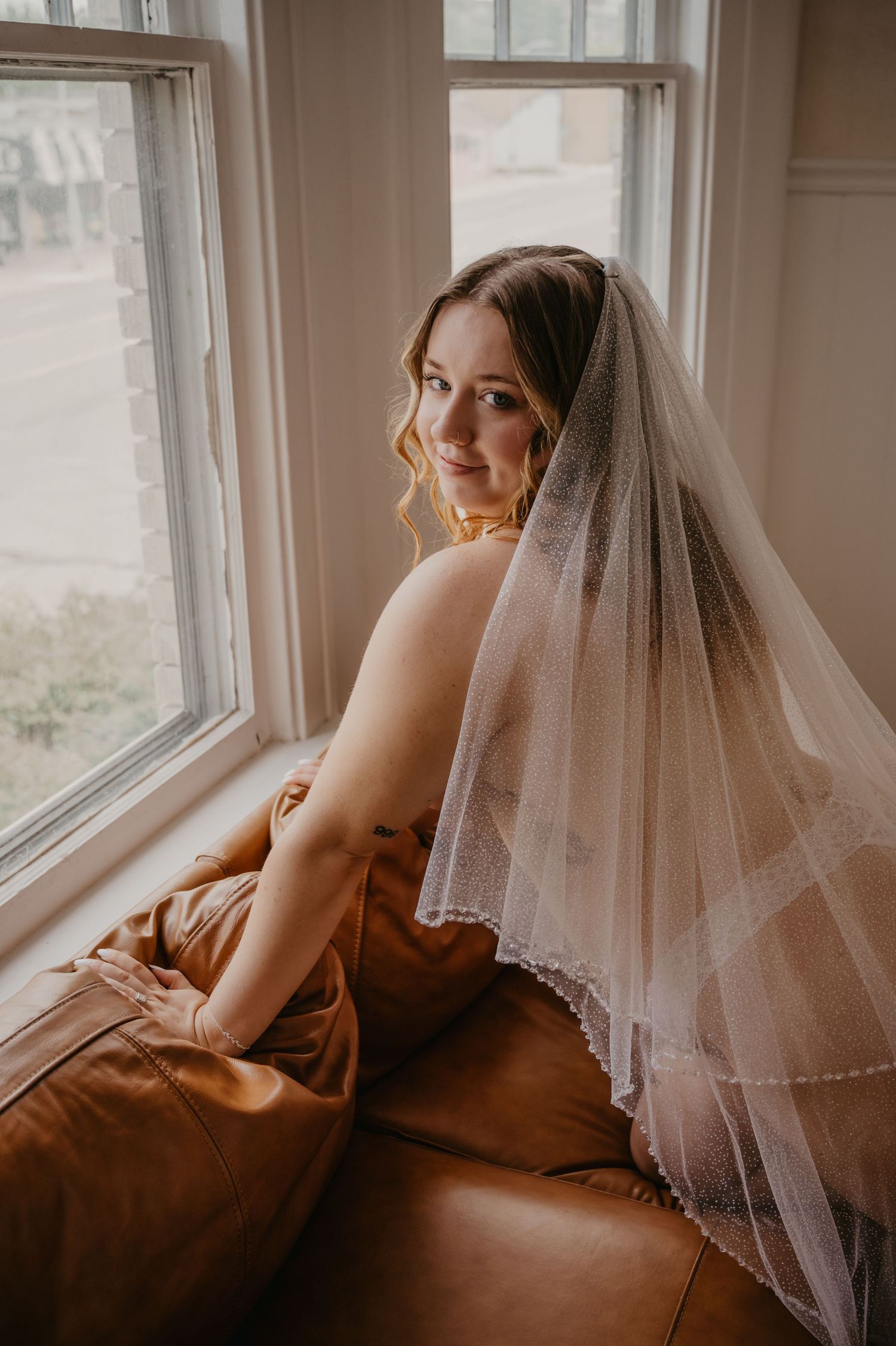 Bridal boudoir session with window light