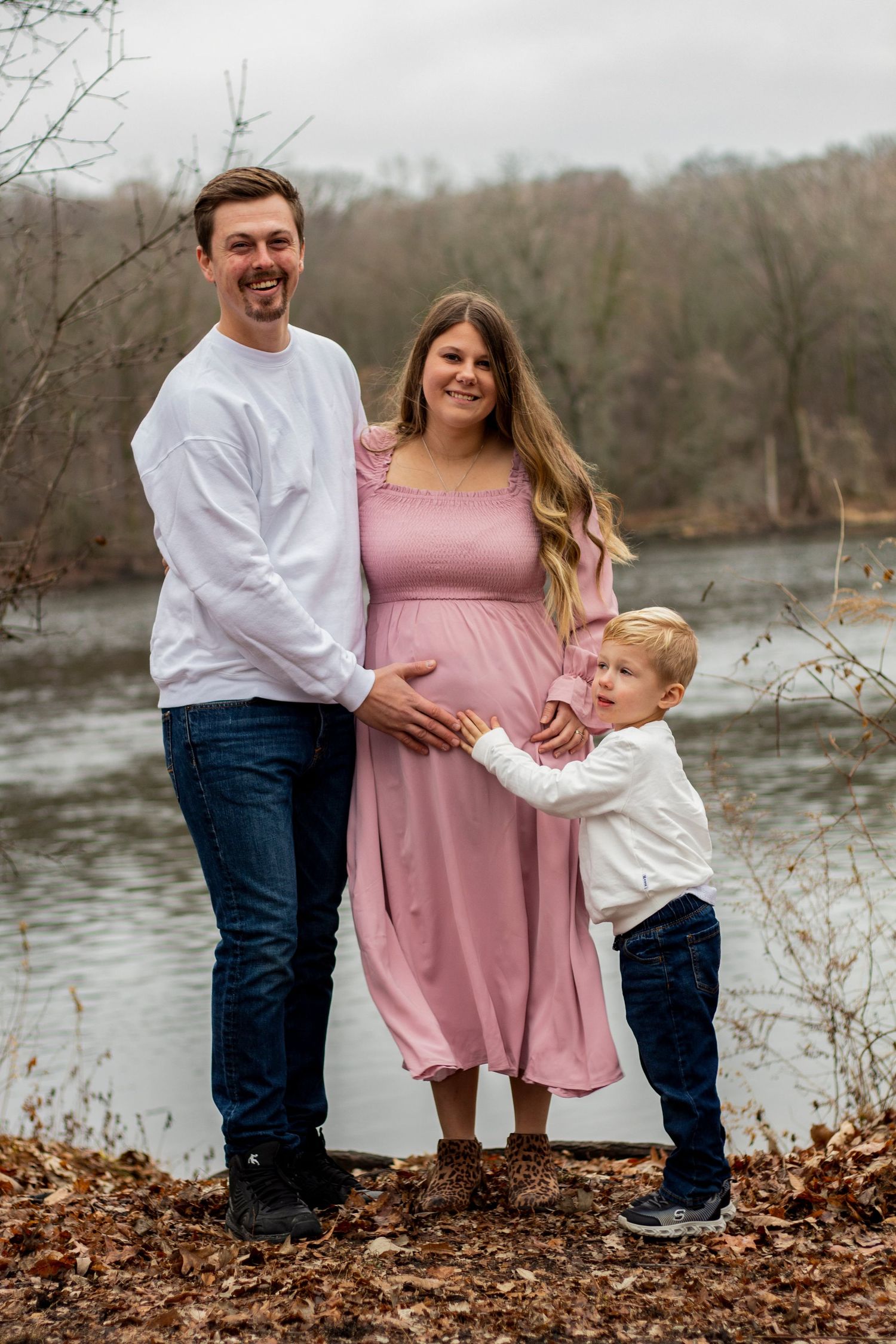 Relaxed and fun maternity session captured in Geneva, IL, featuring an expectant parent in a casual outfit, enjoying a n