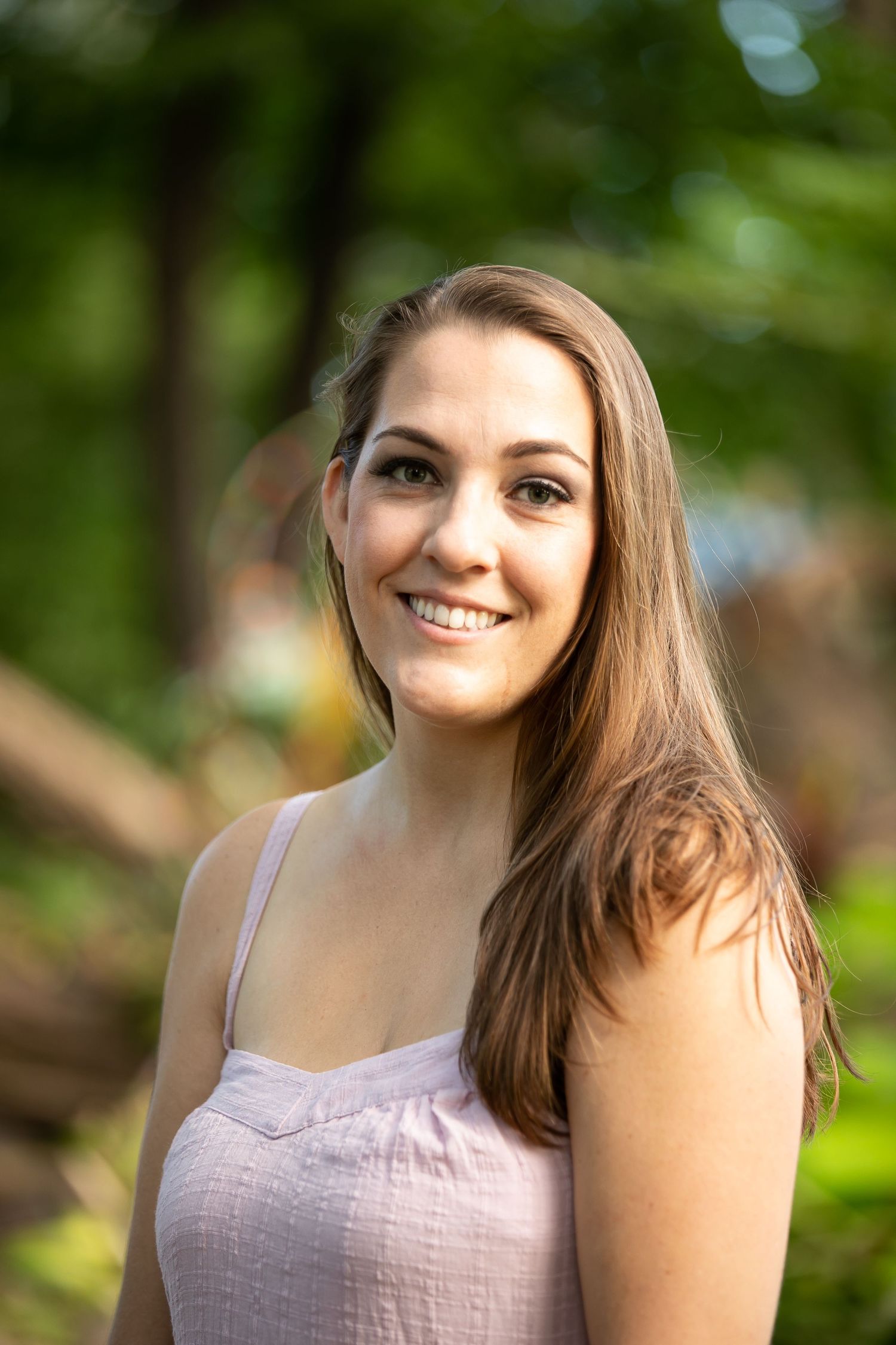 Portrait of Bethany Morrissy, a professional photographer based in South Elgin, IL, specializing in family portraits, co