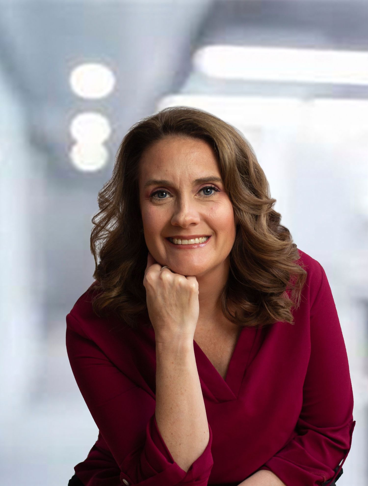 Professional corporate headshot of a business executive, captured in a studio setting in Chicago, IL, showcasing a polis