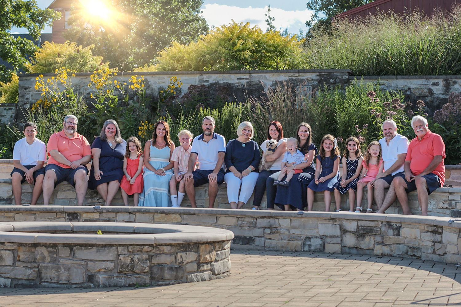 An extended family session at Peck Farm in St. Charles, IL, featuring kids and adults enjoying quality time together ami