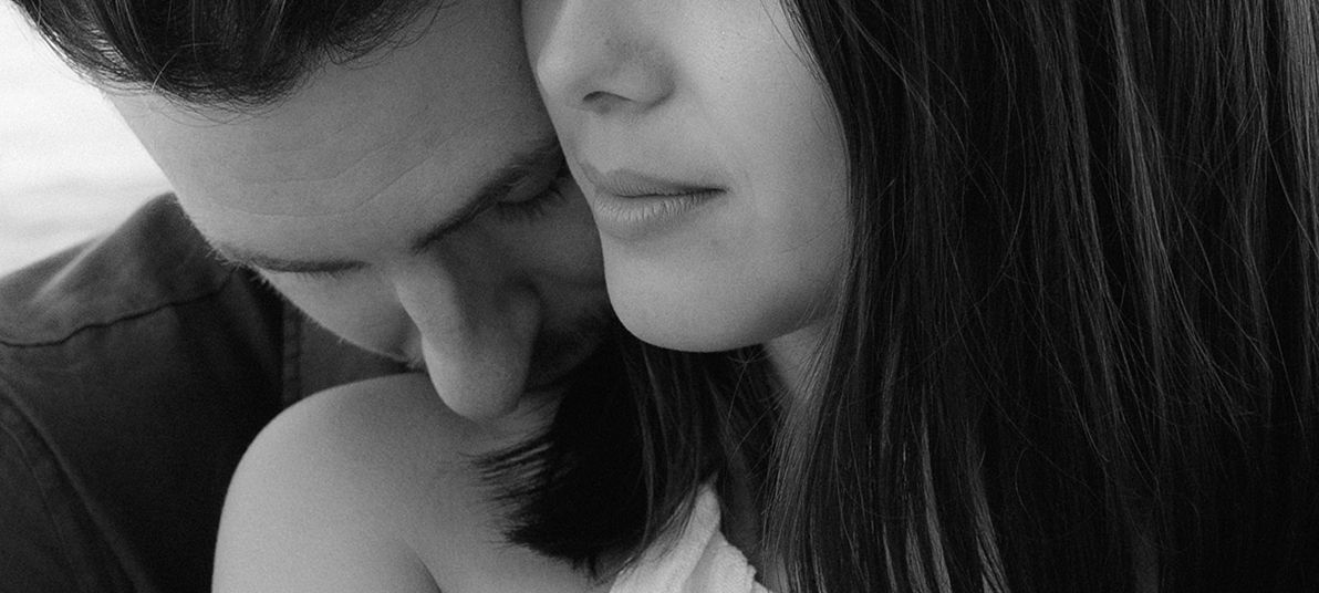 A black and white collage showing close-up views of people's faces in profile and partial views.