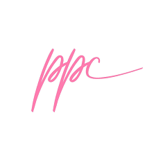 Pink cursive signature or logo text against white background.