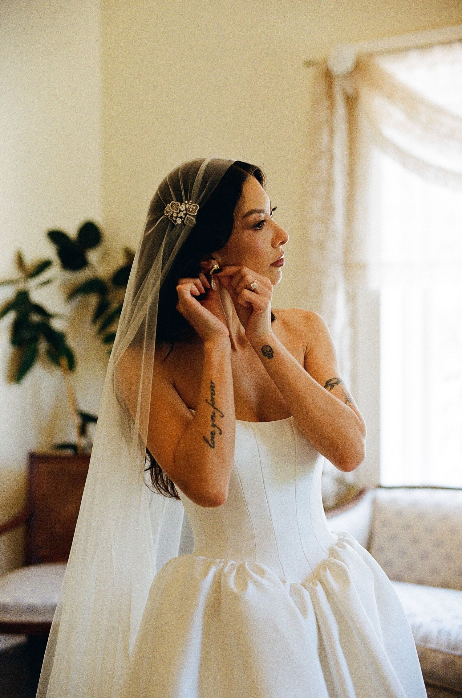 A film photograph of a bride getting ready for her wedding day in California Big Sur