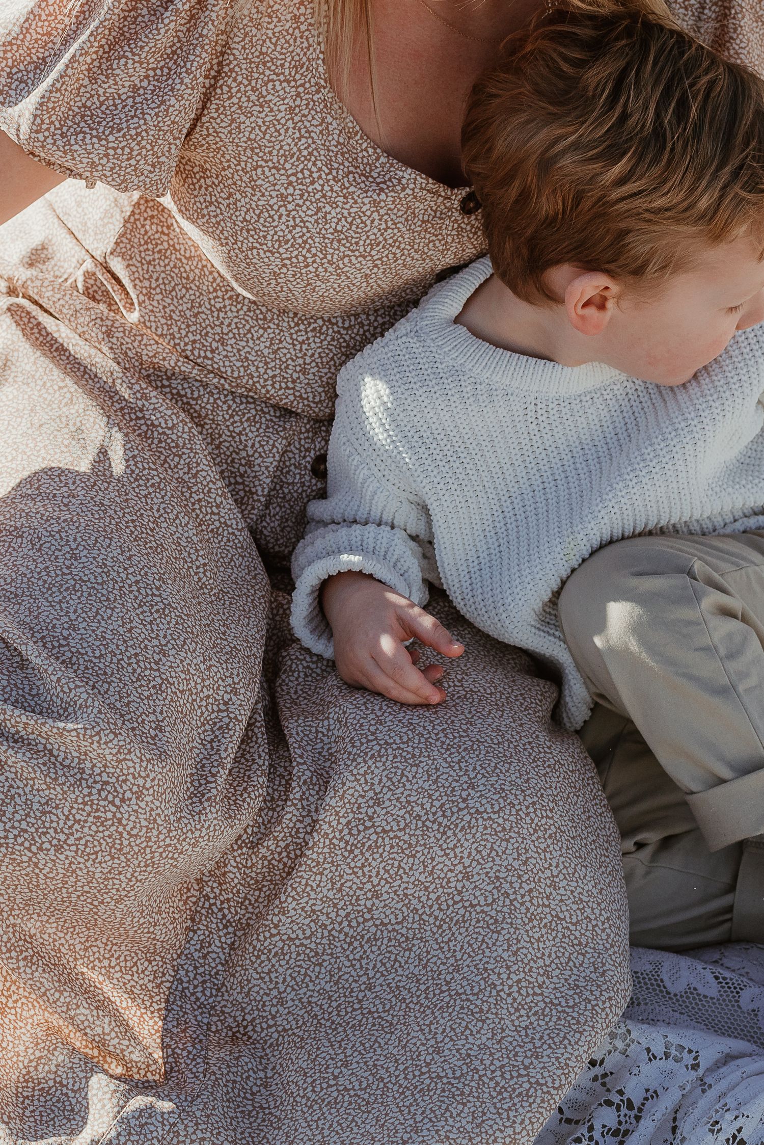 Son rests in mom's lap