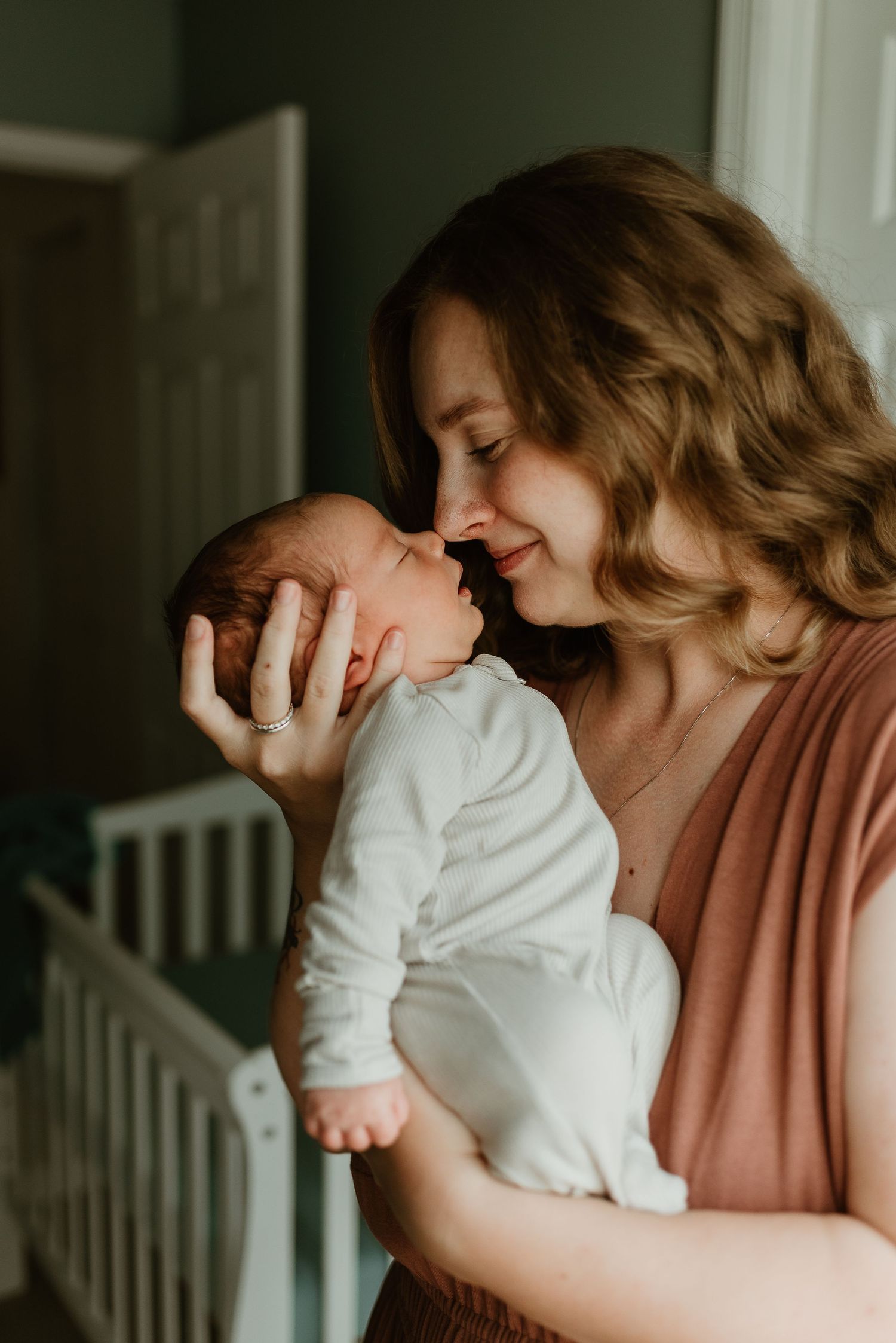 A tender moment between parent and child in soft natural light, showing a series of intimate embraces.