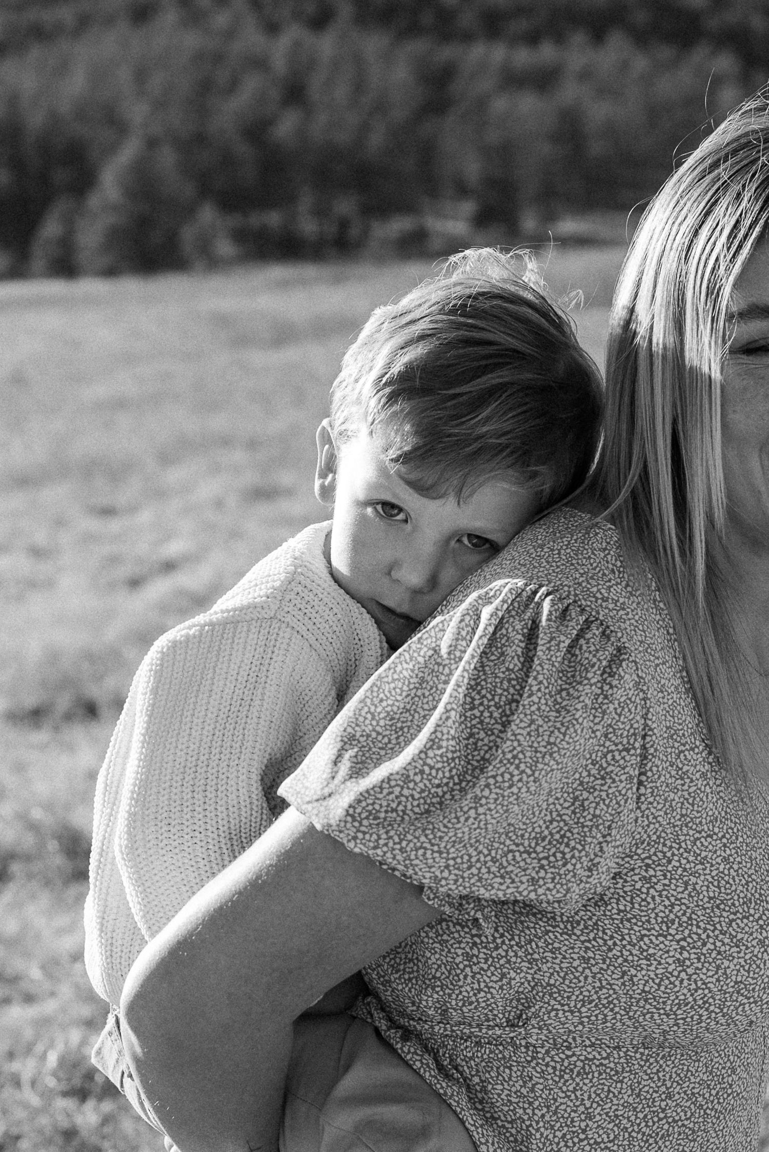 Son on mom's back