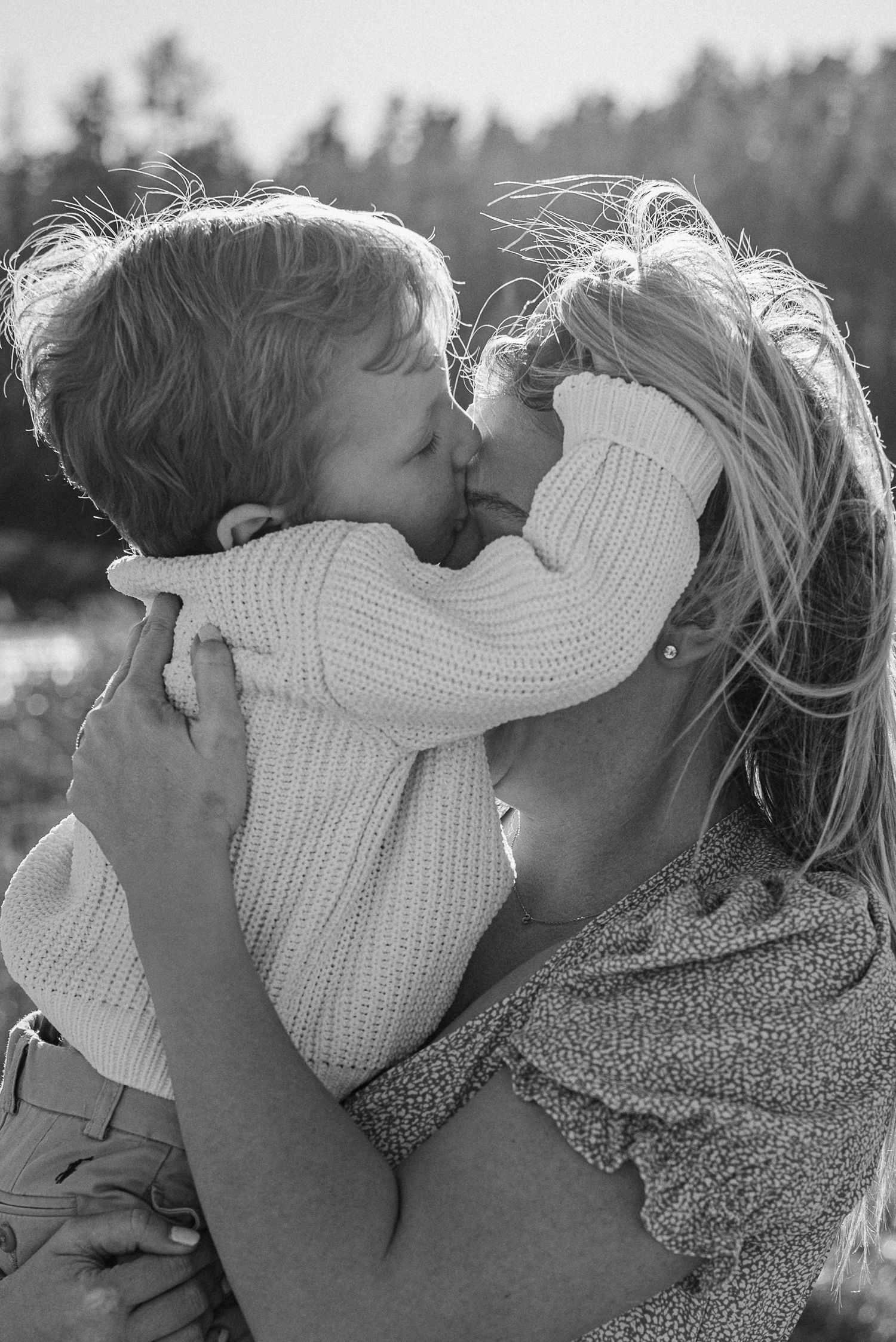 Son kisses mom on forehead