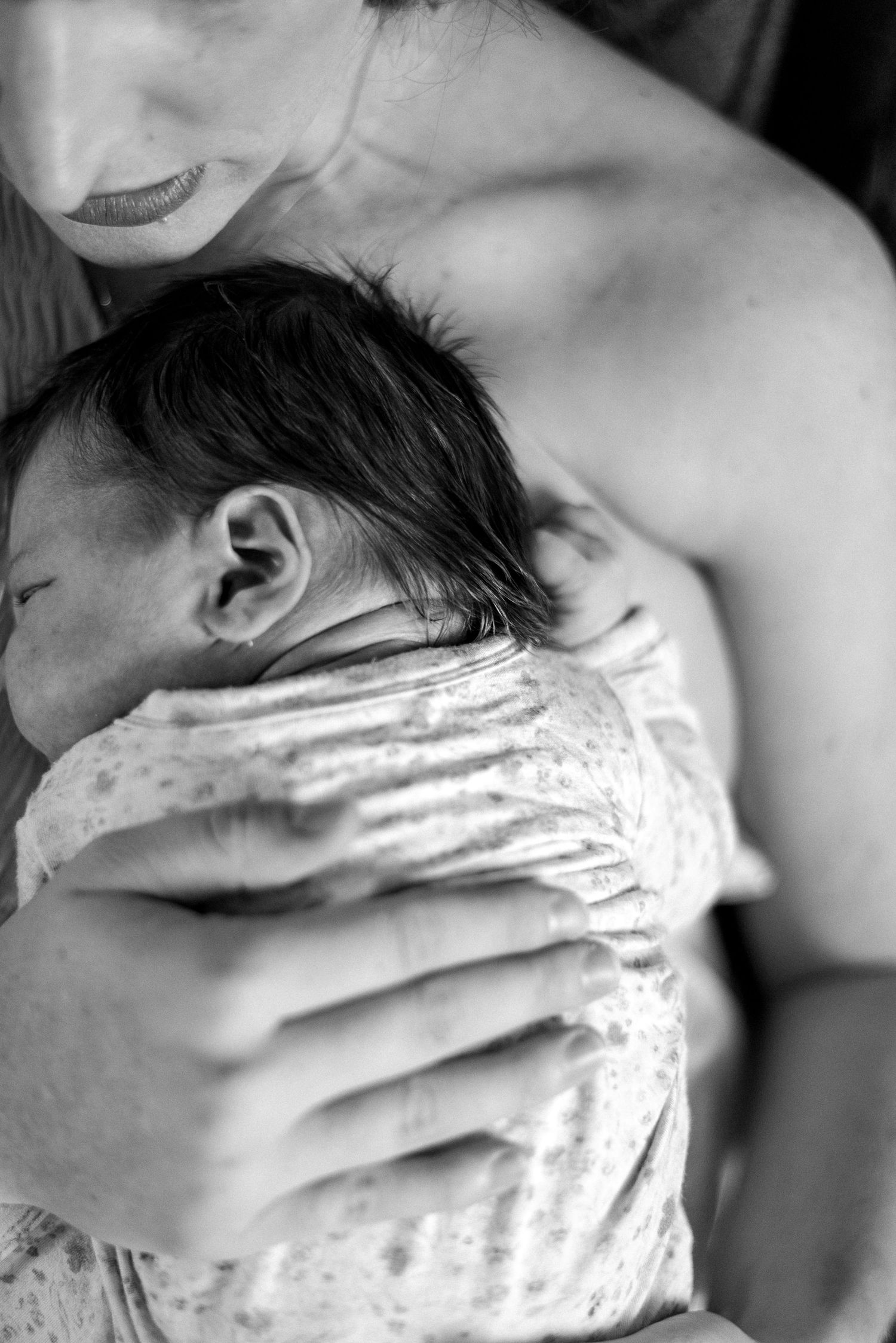 A black and white artistic photo series showing a hand gently caressing a neck in multiple sequential frames.
