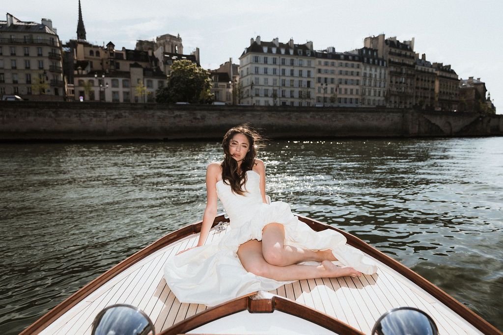 Private Paris boat elopement: Scenic Seine River cruise past historic monuments without the crowds. Bespoke wedding photography