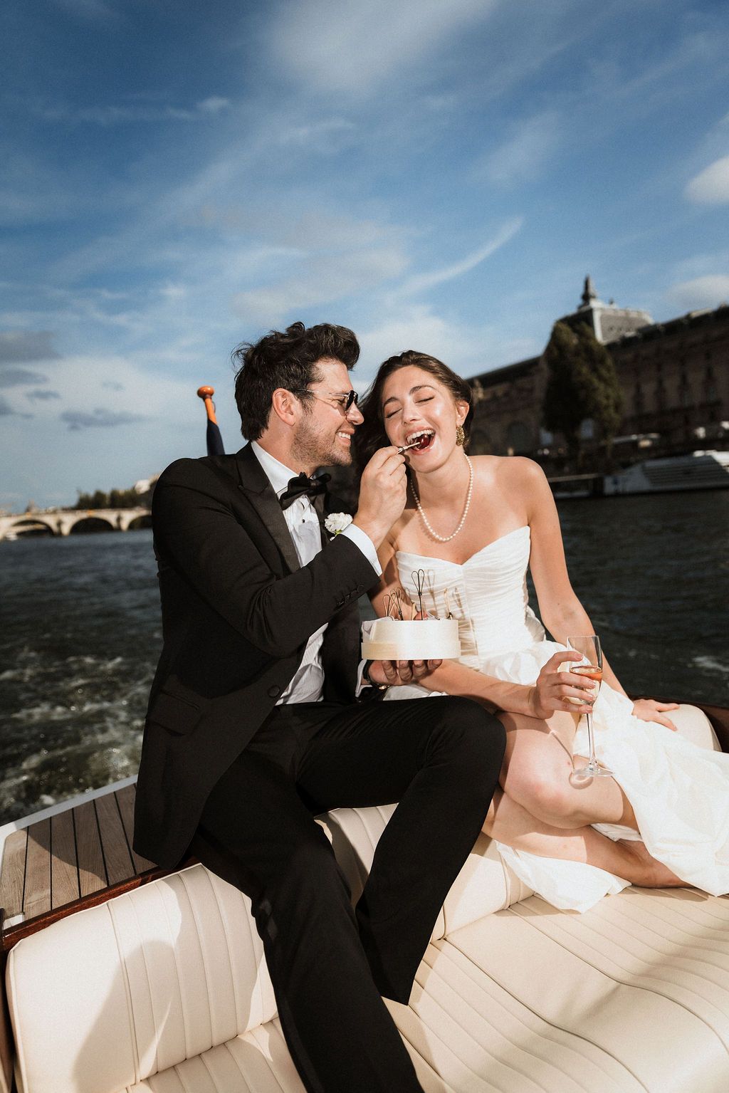 Private Paris boat elopement: Newlyweds sharing romantic moments on the Seine with iconic monument views and no crowds
