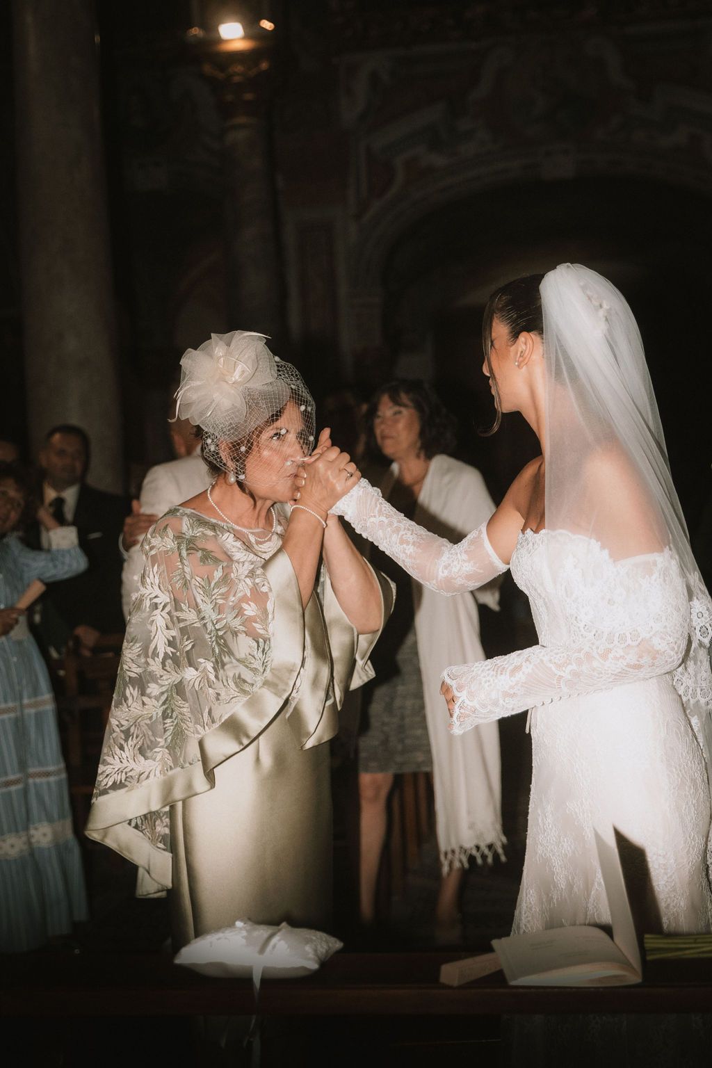 Wedding reception dance sequence showing couples in white dresses and formal attire.