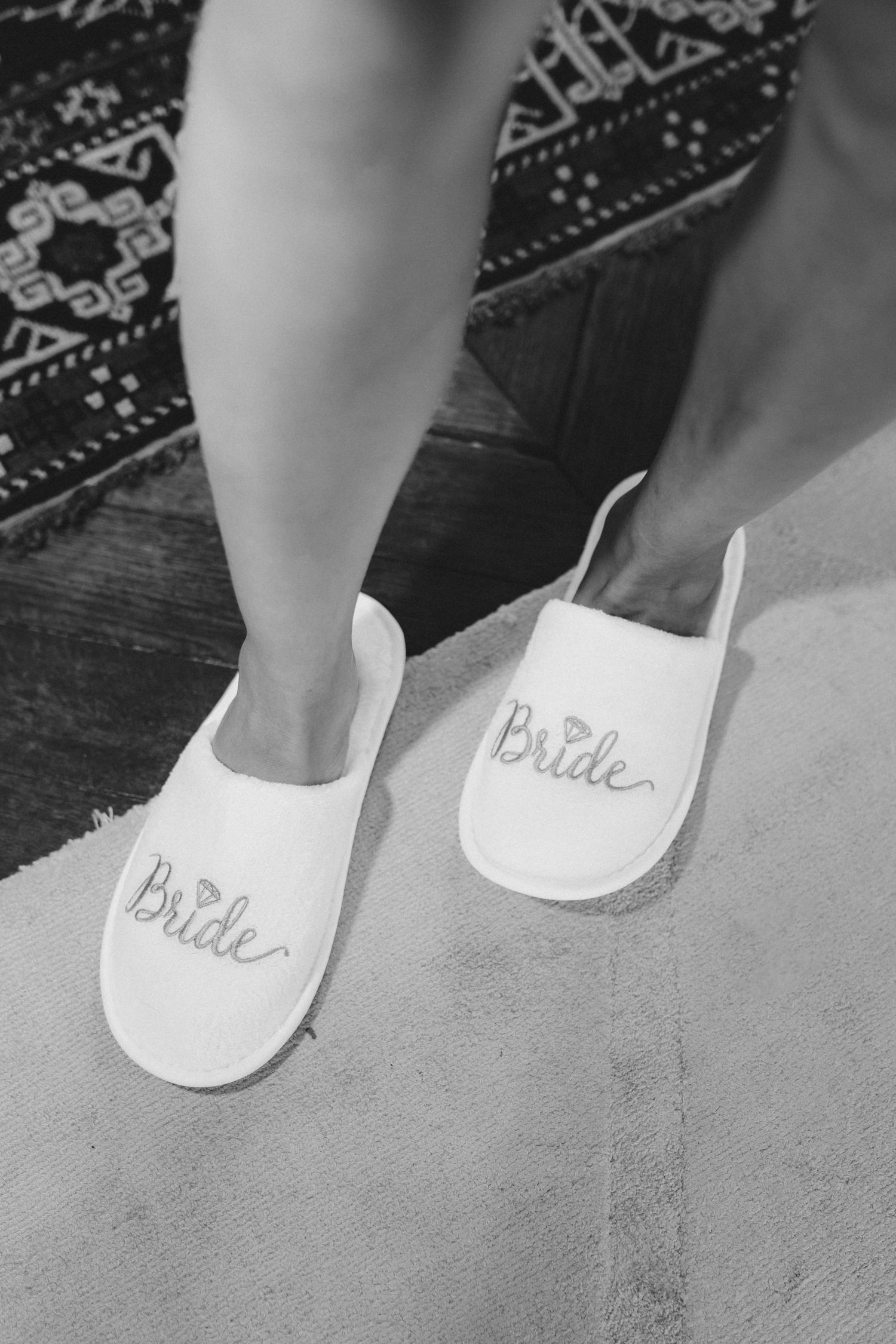 A sequence of black and white photos showing a ballet slipper being written on with text in cursive handwriting.