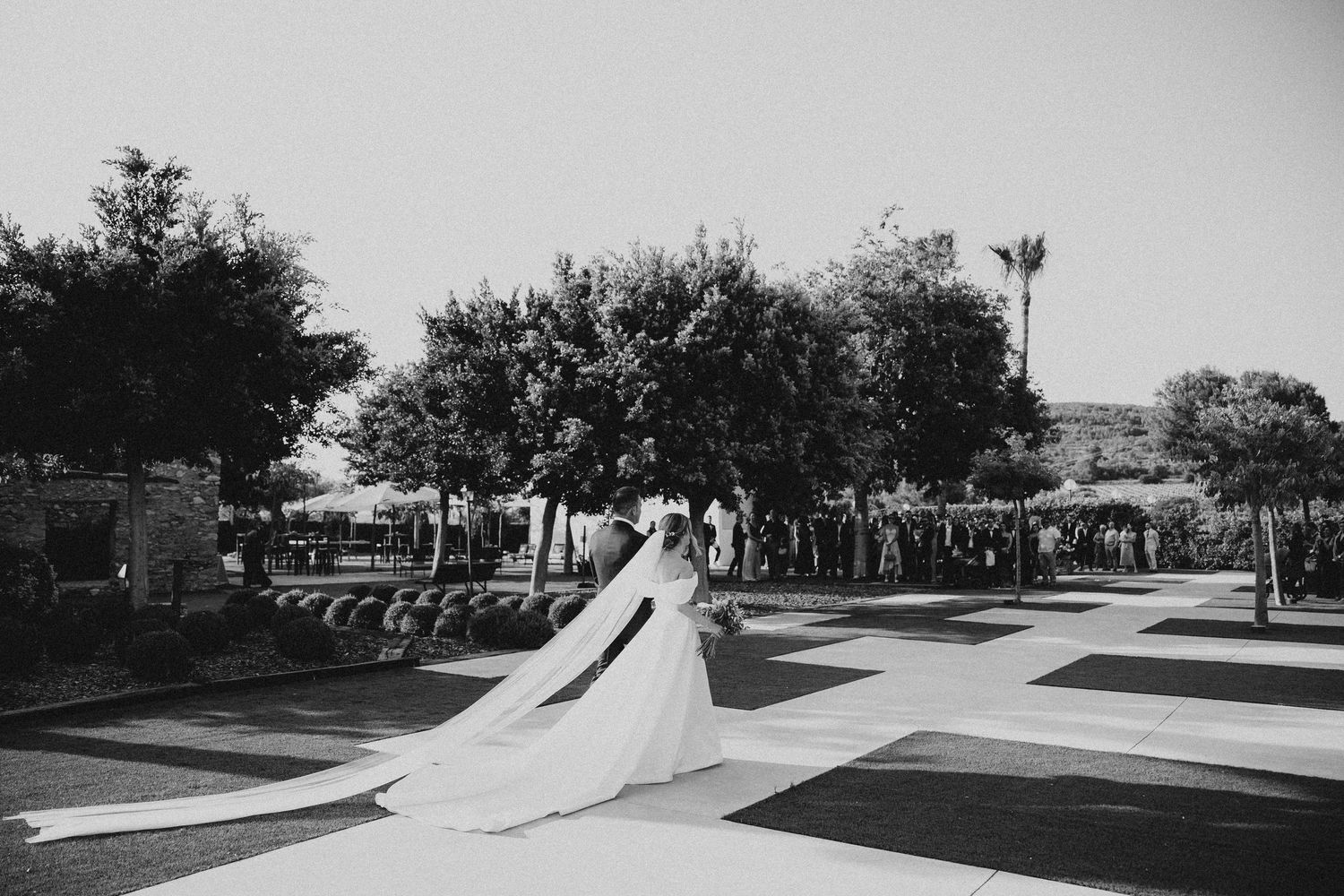 Black and white sequence showing a skateboarder performing a trick on a concrete ramp at a skate park. Masia Les Casotes.