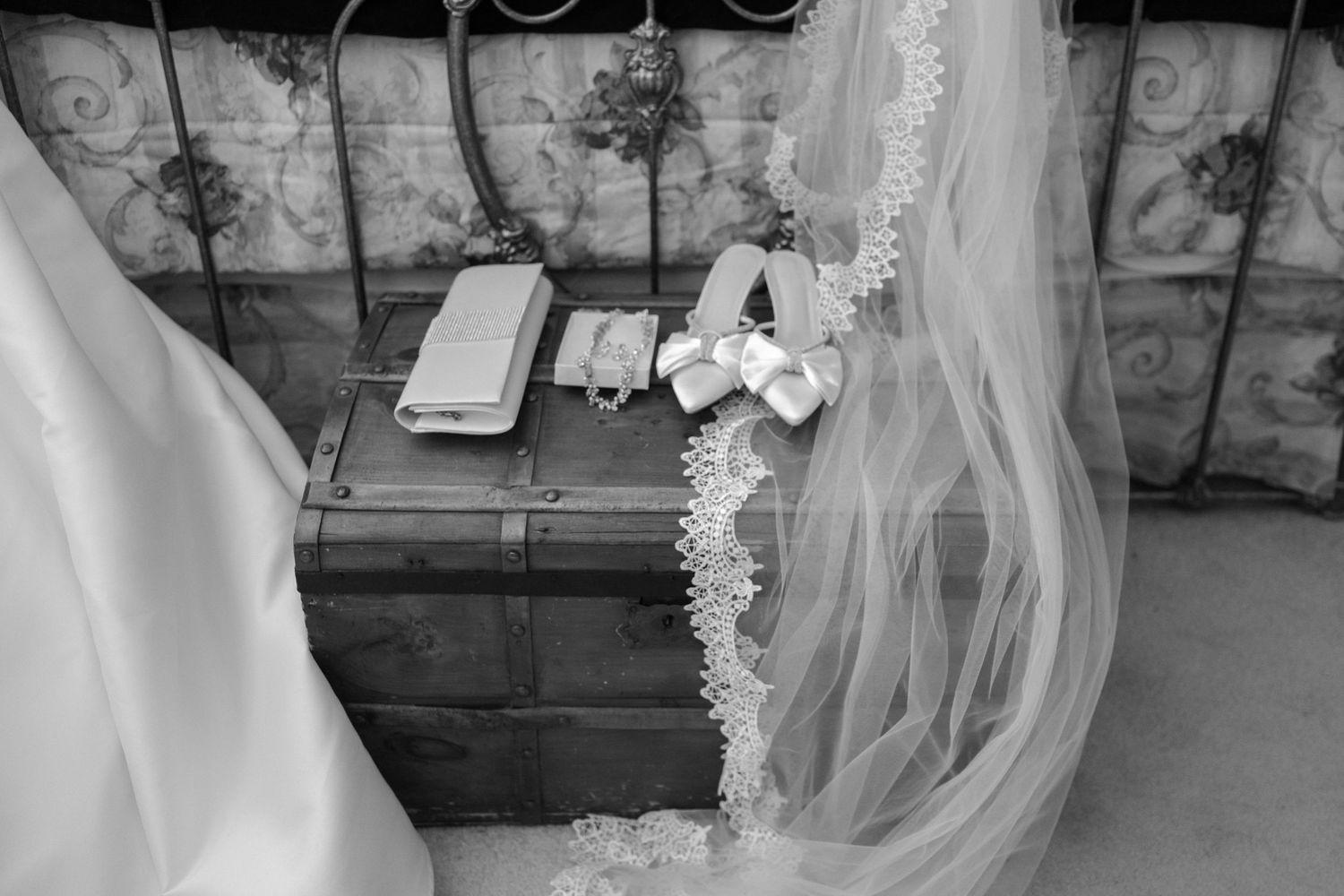 Elegant wedding veil billowing in the wind during an outdoor ceremony.