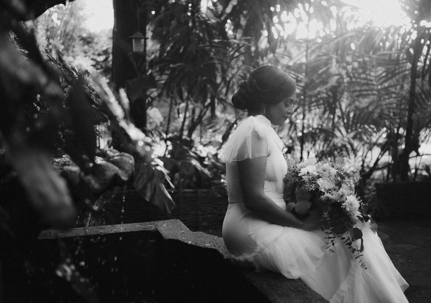 Dreamy black and white wedding photos with dramatic lighting and silhouettes.