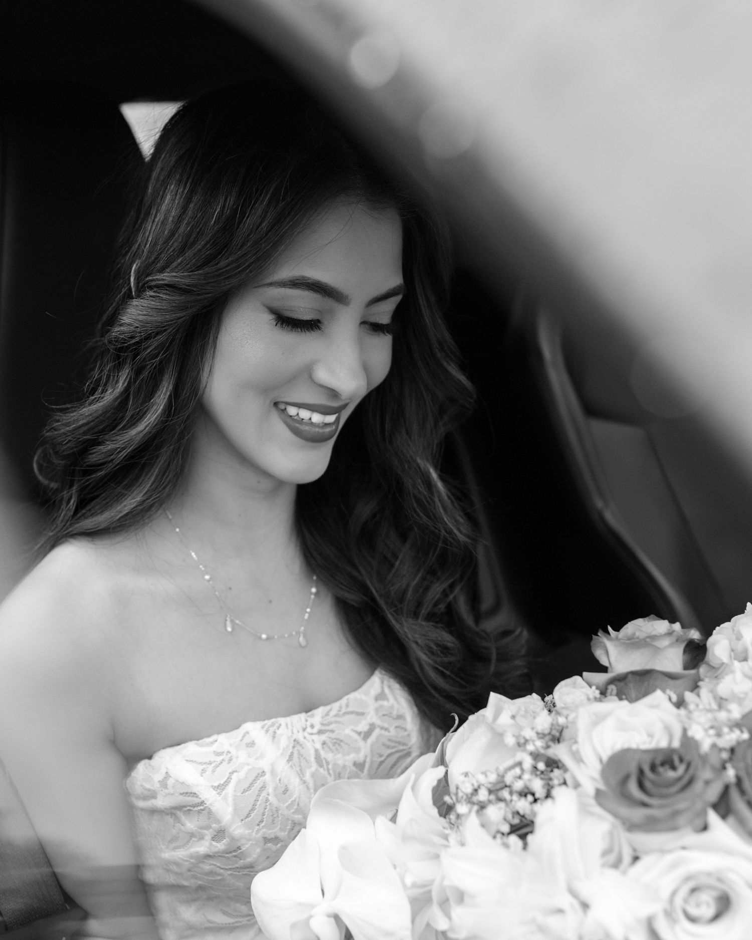 Black and white photos of a bride in a lace wedding dress showing close-up details and romantic expressions.