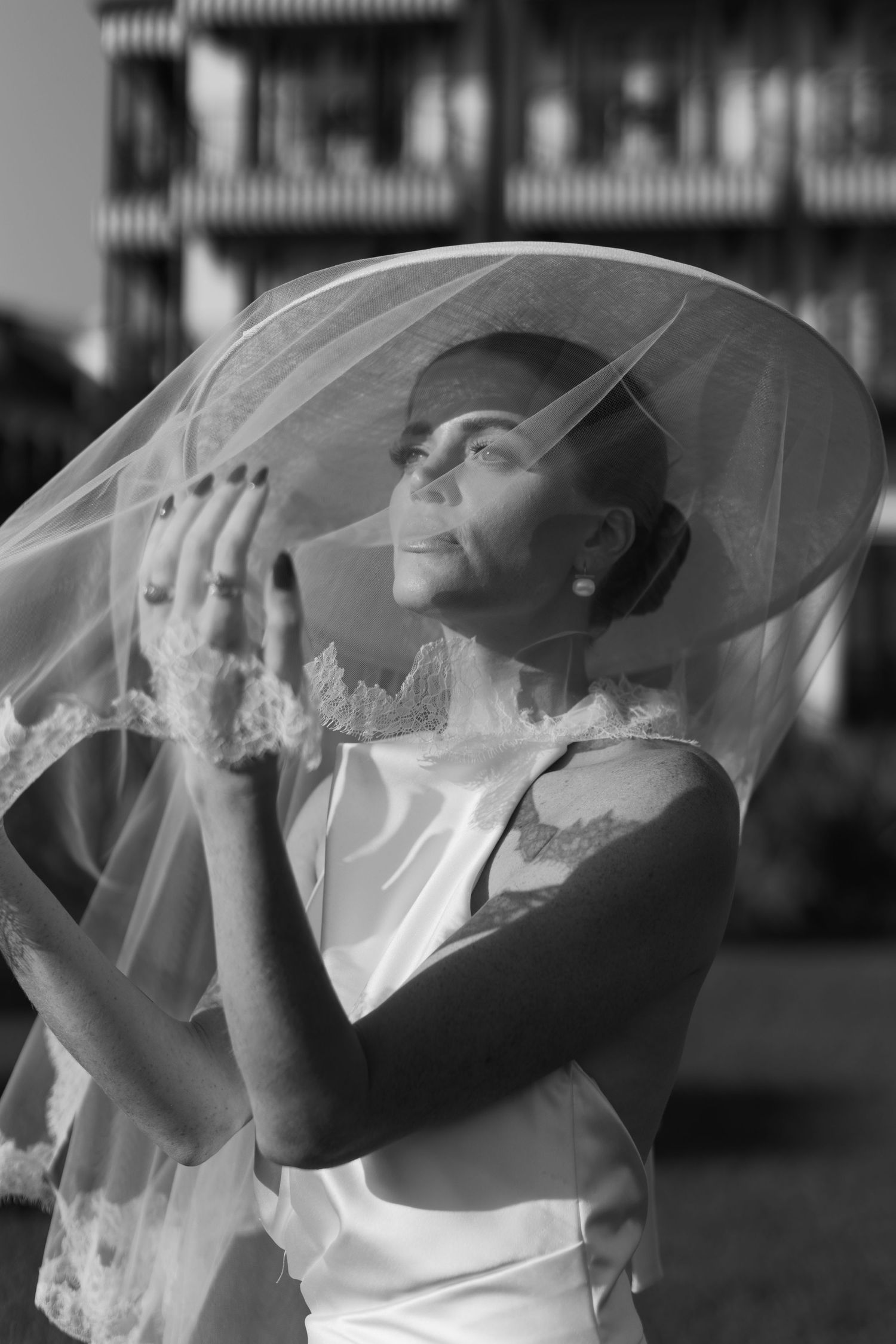 Artistic black and white sequence showing flowing veil movement.
