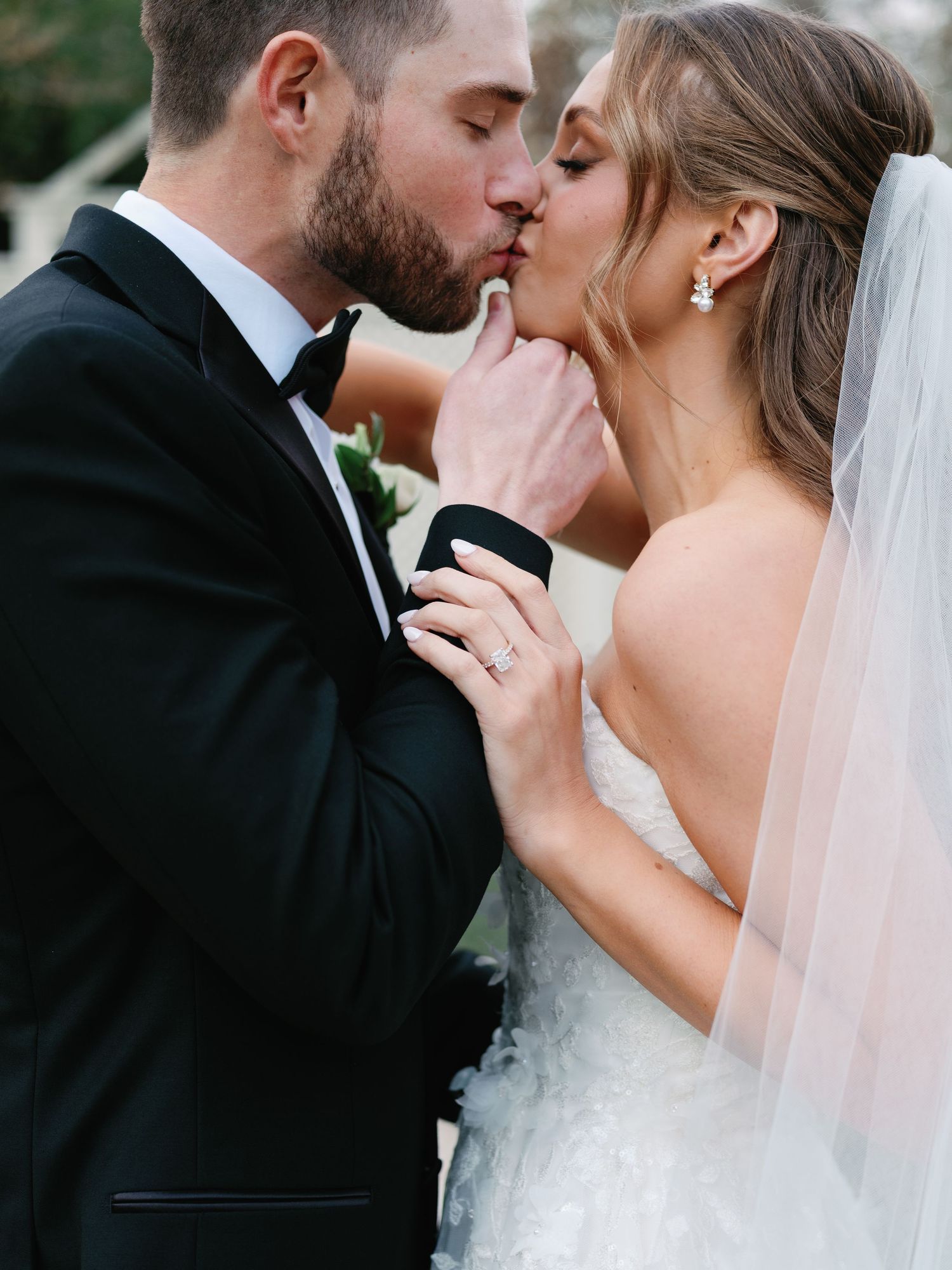 Romantic wedding photo sequence showing close-up kisses between a couple in formal attire with a white veil.