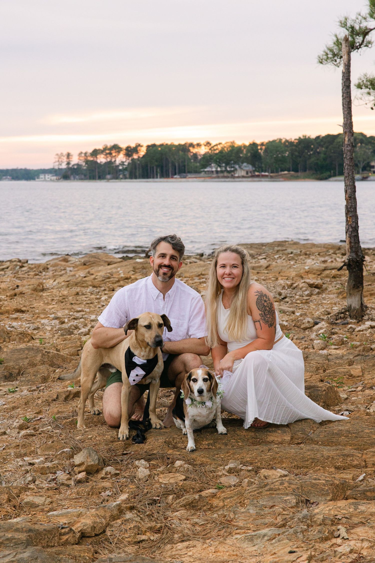 Kelly and Philip pose for a classic portrait with their dogs on Lake Murray in South Carolina.