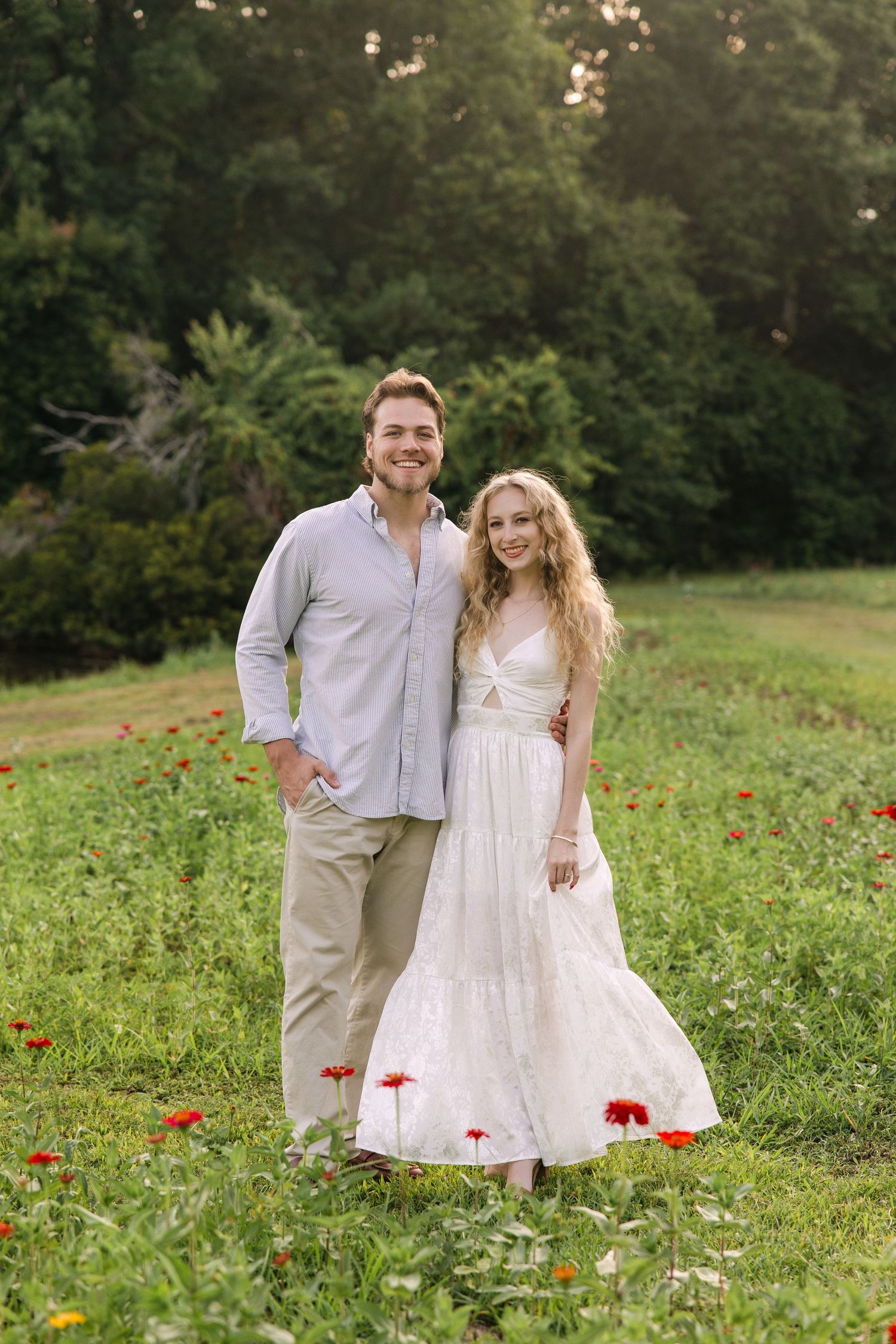Emily and Harrison smile for a classic portrait during their engagement session in Gilbert, SC.