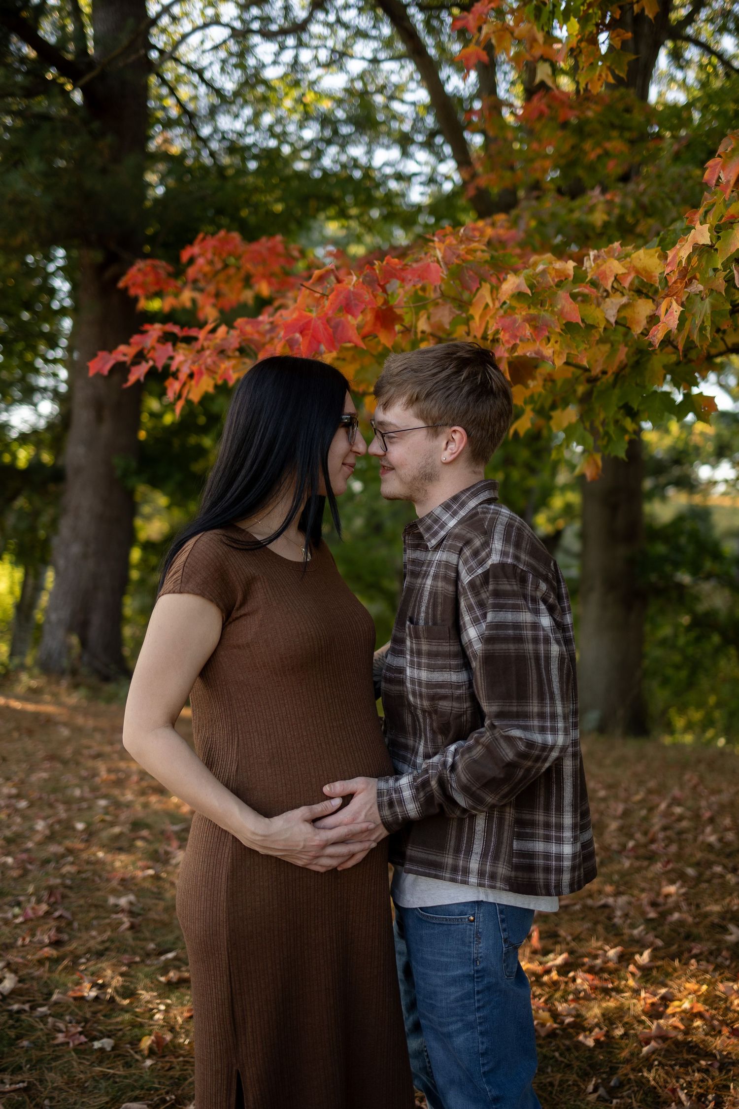 Intimate maternity photography session with soft natural light