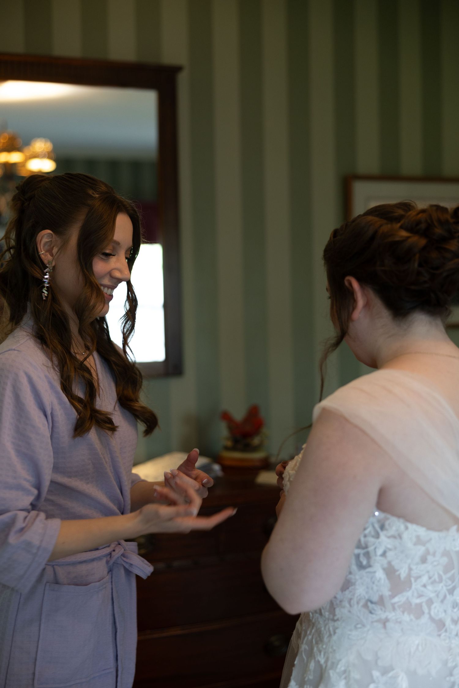 Candid bridal getting ready photo by Buffalo wedding photographer