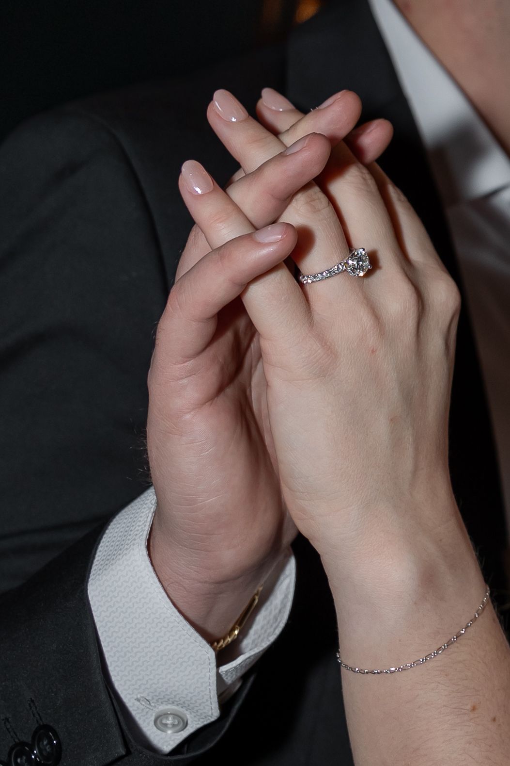 Fine art engagement ring photography with soft romantic lighting