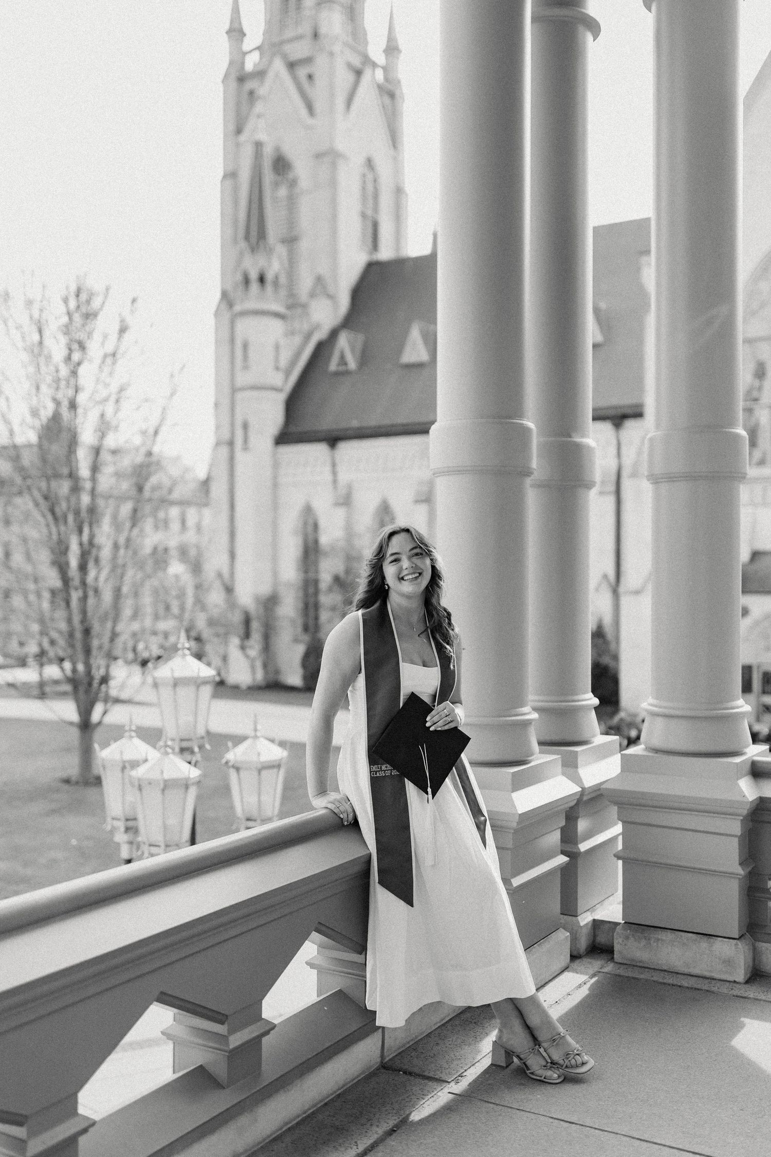 Black and white photos showing a person posing elegantly on white columns of a classic building porch.