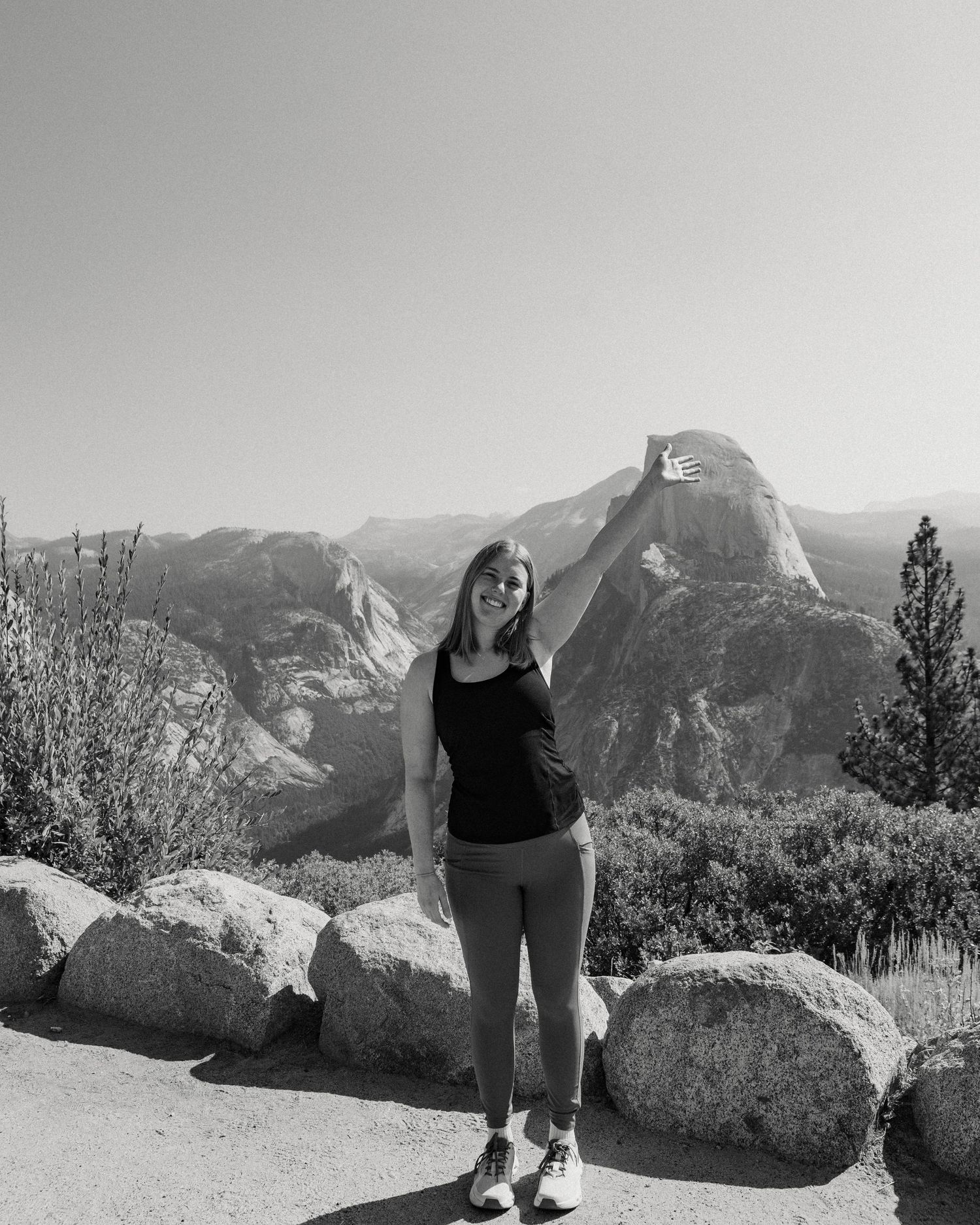 Black and white landscape photos at a mountain viewpoint overlooking dramatic peaks and valleys.