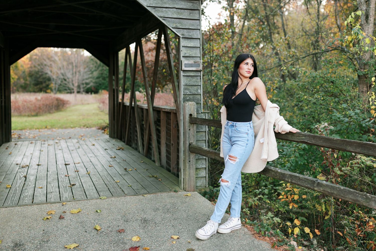Outdoor lifestyle photos on a wooden boardwalk surrounded by nature.