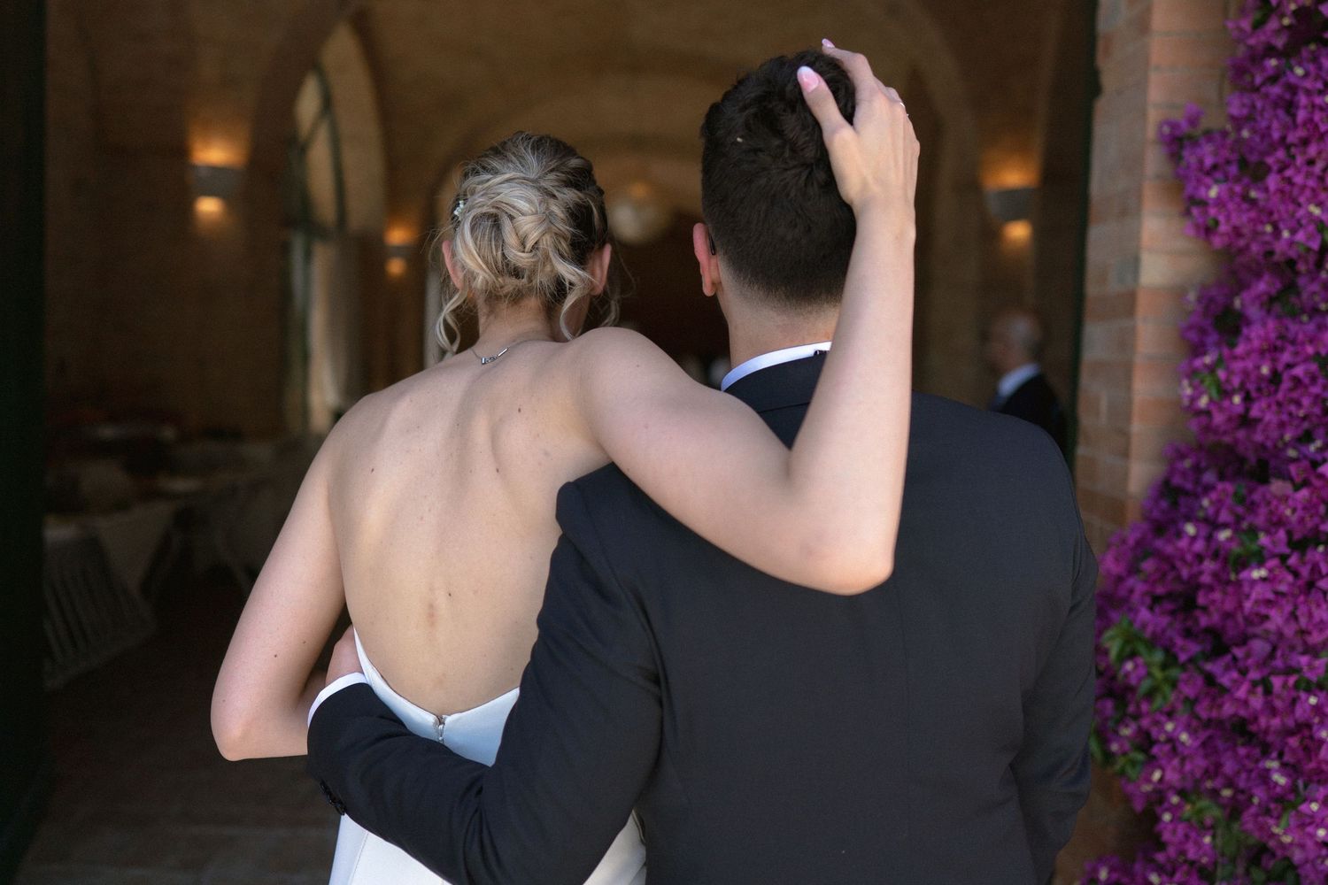 Couple dancing together at elegant evening reception.